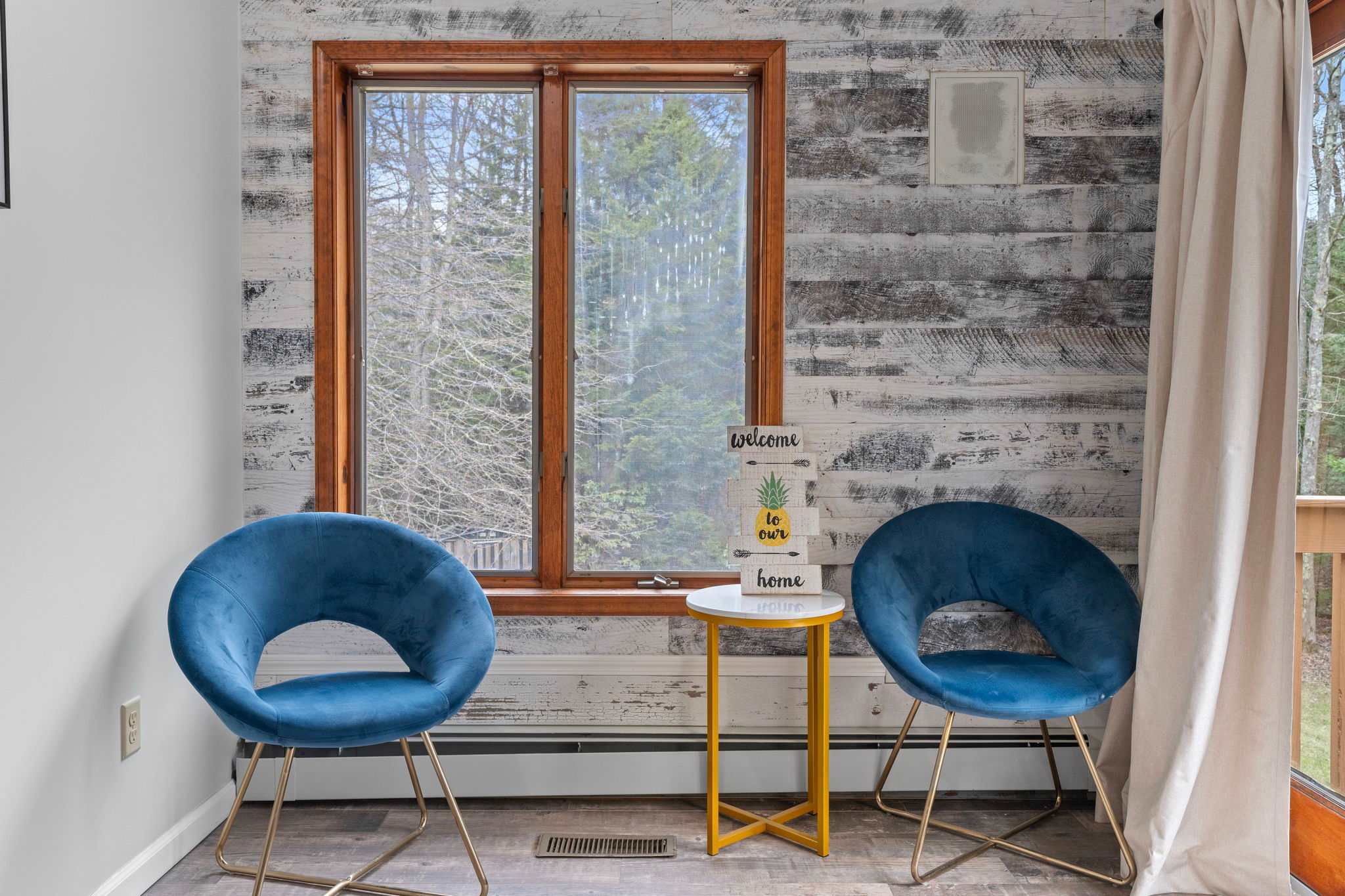 Sweet Little Seating Spot
Perfect for morning coffee or quiet chats, this cozy nook adds charm and comfort with a view.