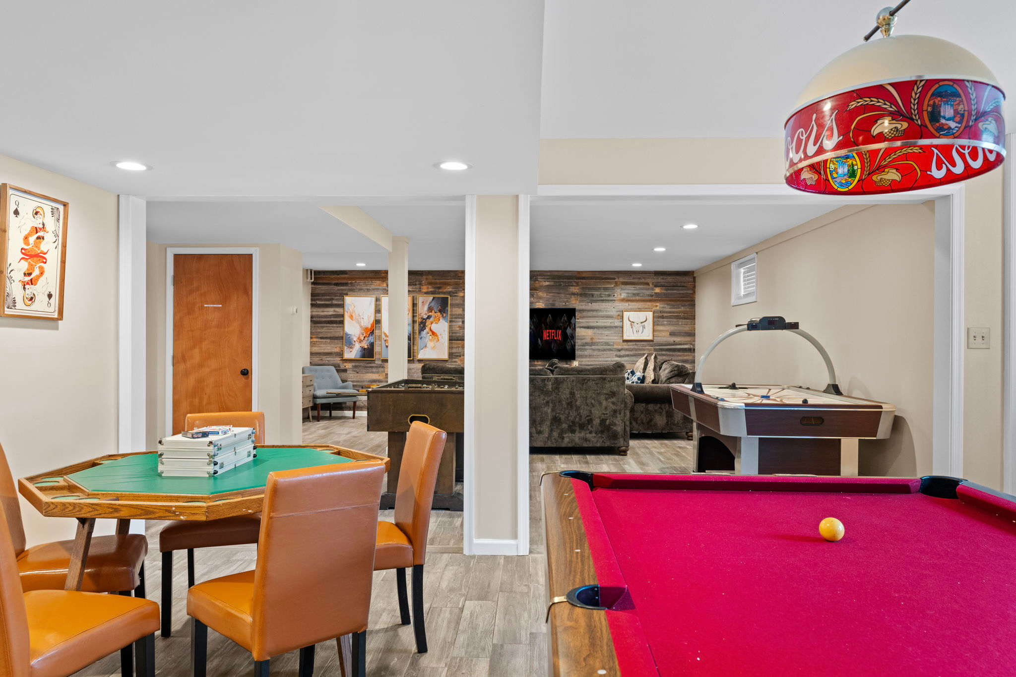 Your Game Zone Awaits
Whether you're playing cards, pool, or just chilling, this multi-use space is built for good times.
