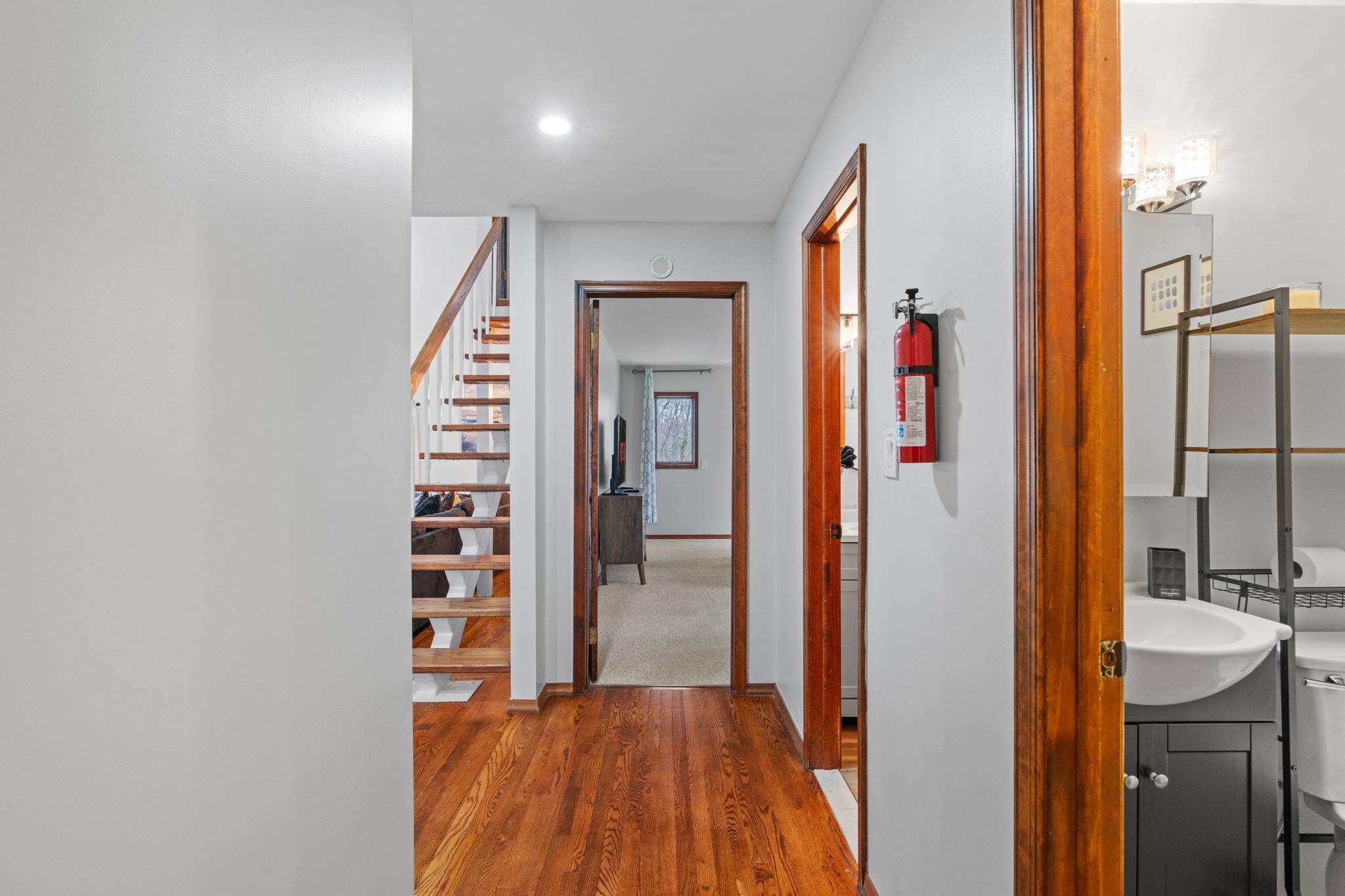 Peek Into the Powder Room
A glimpse into one of the bathrooms, neatly tucked off the main hallway for easy access.