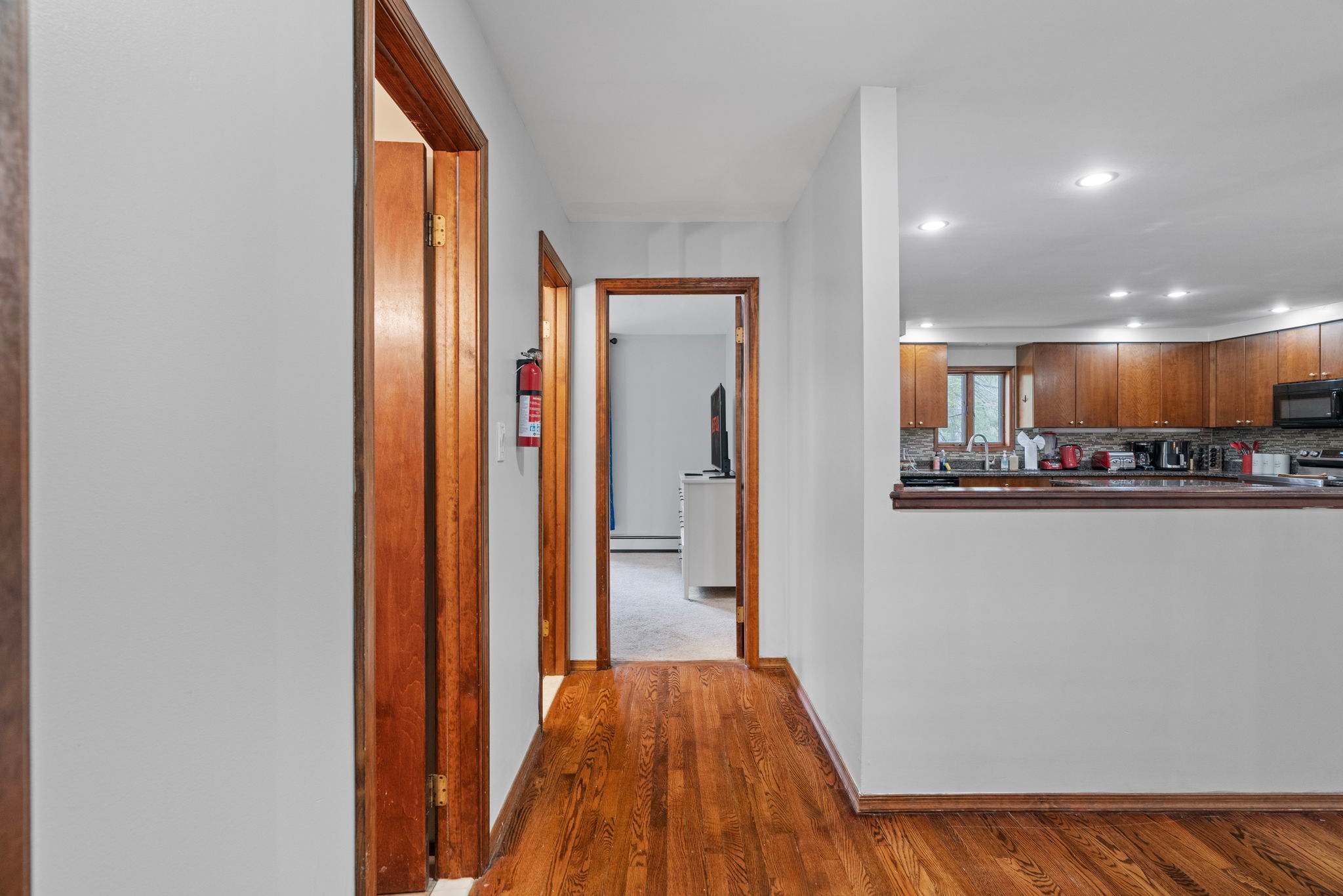 Open Flow and Easy Access
This central hallway connects you to all the essentials, with the kitchen just around the corner.