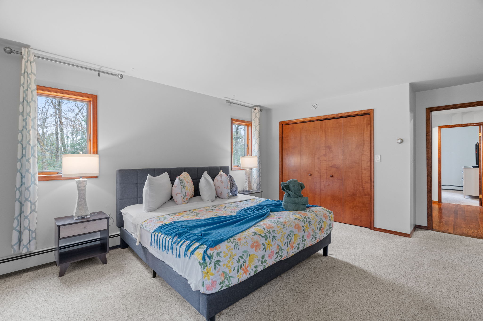 Comfort That Feels Like Home
This cozy setup features soft bedding, charming wood accents, and calming window views.