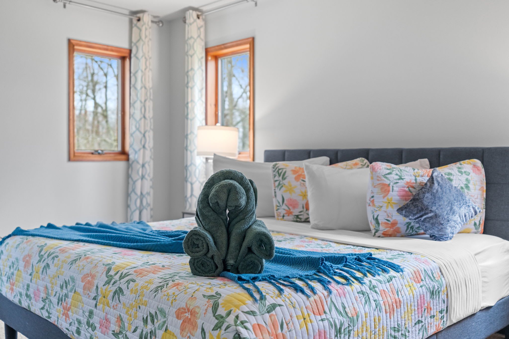 Floral and Fresh Vibes
Fun pops of color and plenty of pillows create a playful and cozy atmosphere for a perfect night in.