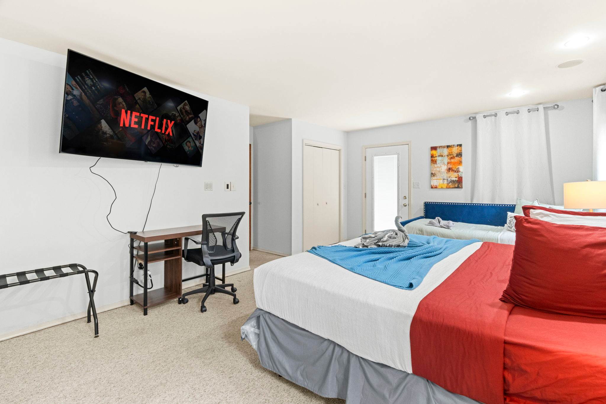 Comfy with a Side of Entertainment
Catch up on your shows from bed or take a moment to chill in this perfectly arranged space.