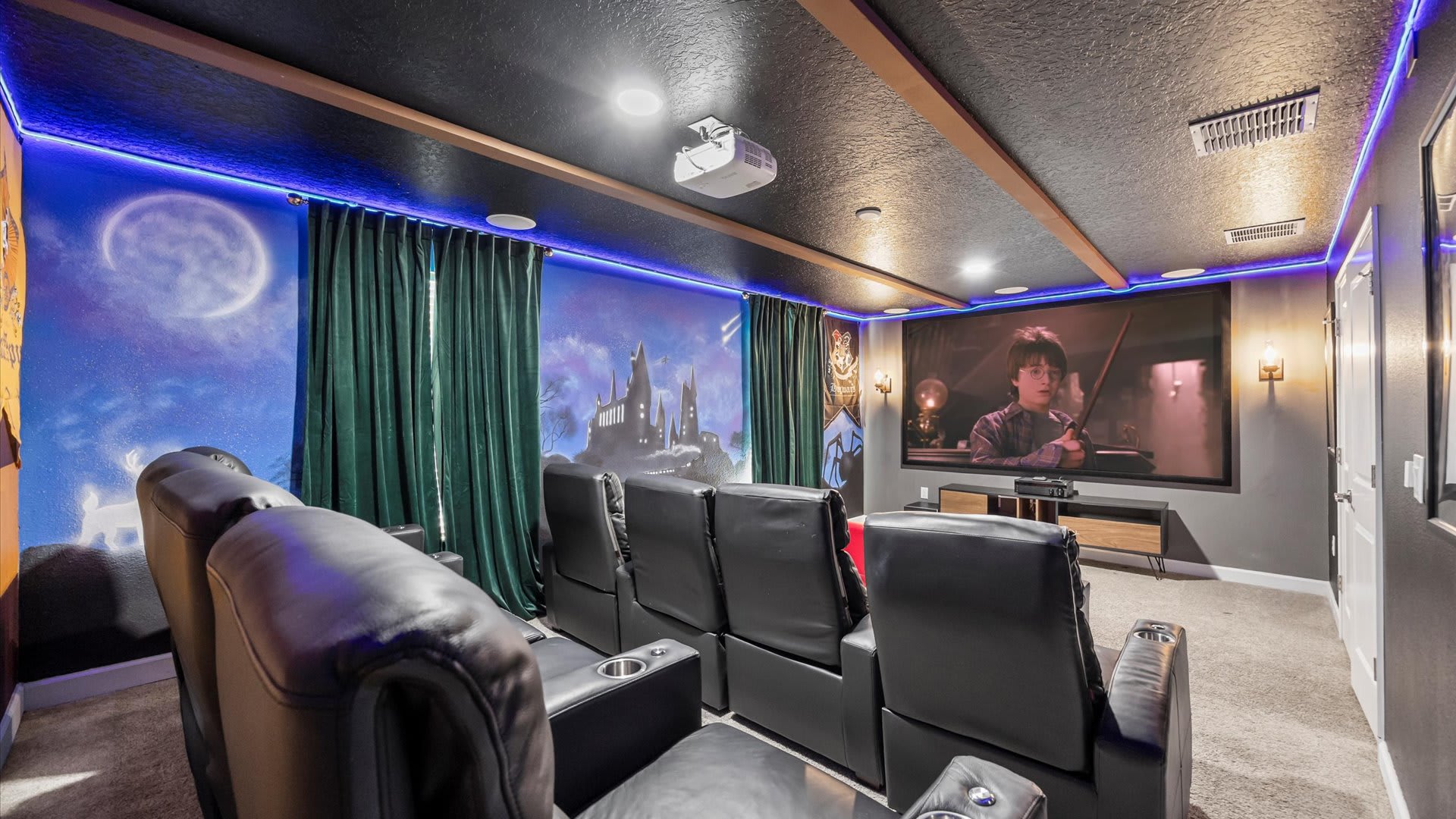 Harry Potter themed in-home cinema with large projector screen
