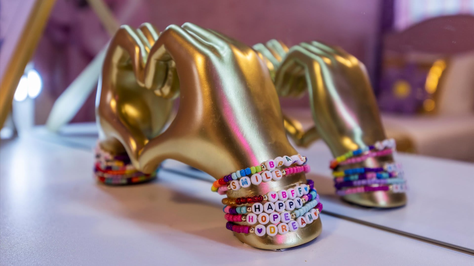 Stylish golden hand bracelet decor piece