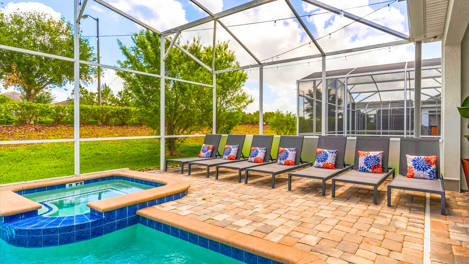 Swimming pool with relaxing sun loungers