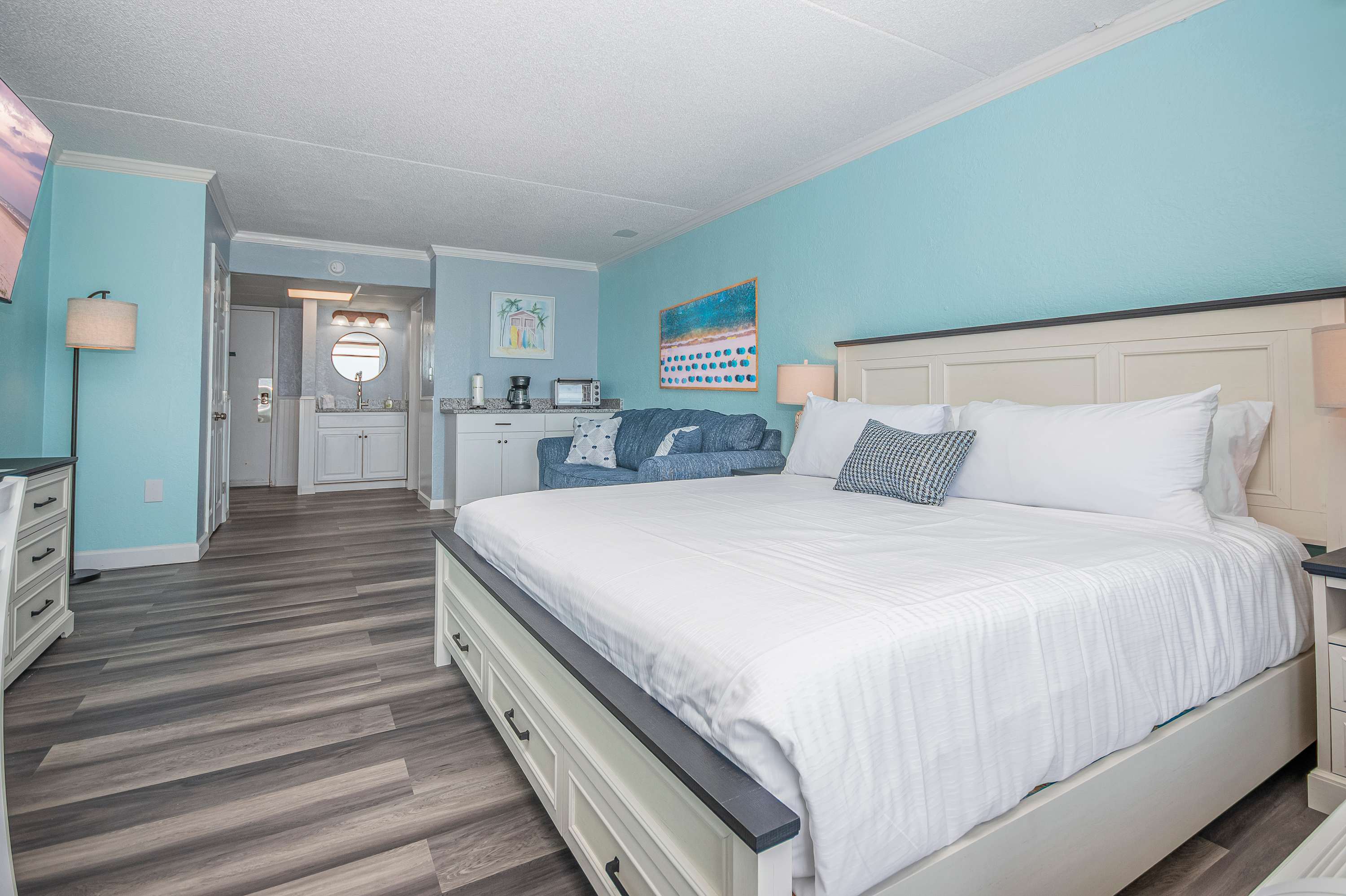New floors look stunning in this newly renovated condo