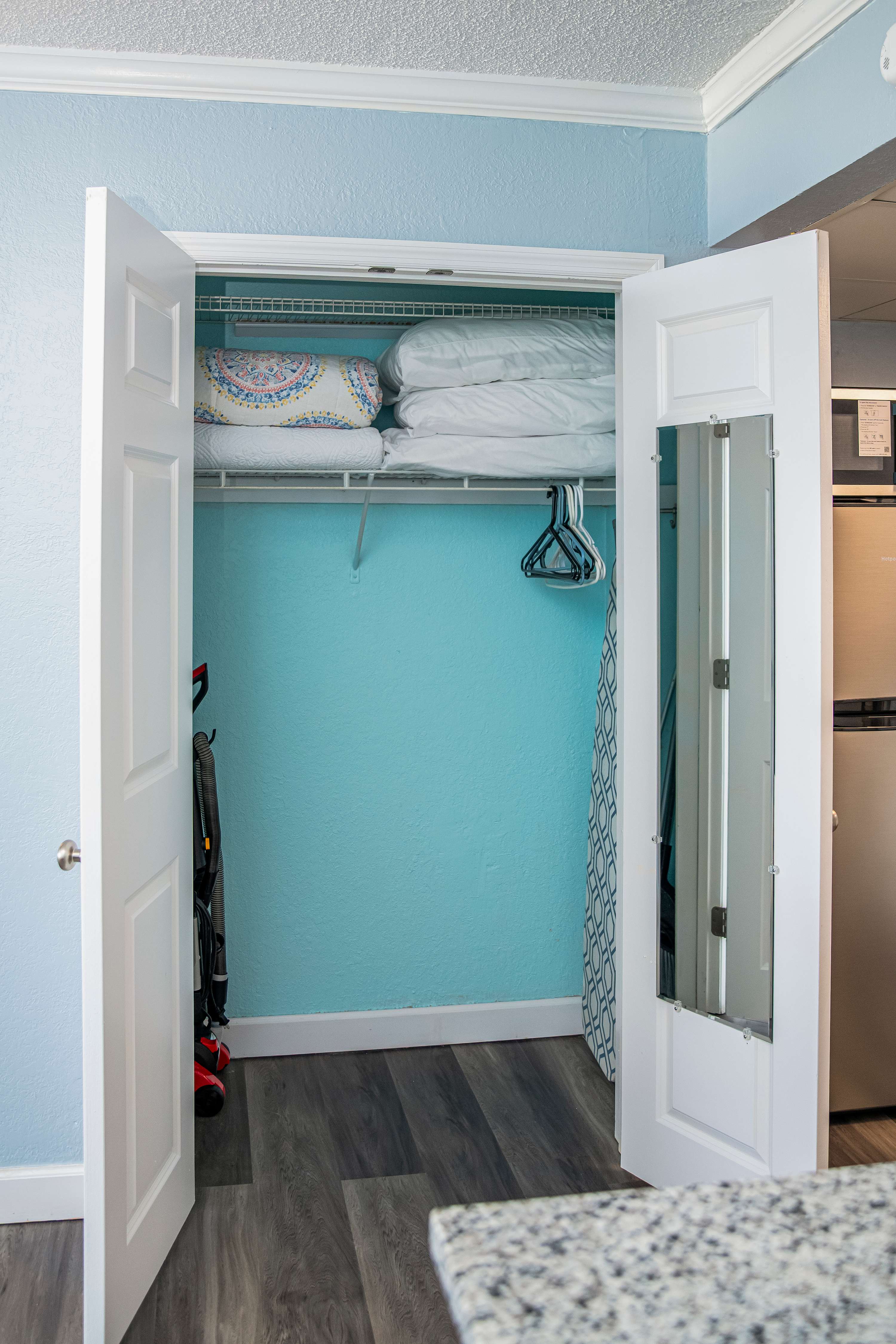 Spacious closet hold all the extras you may need