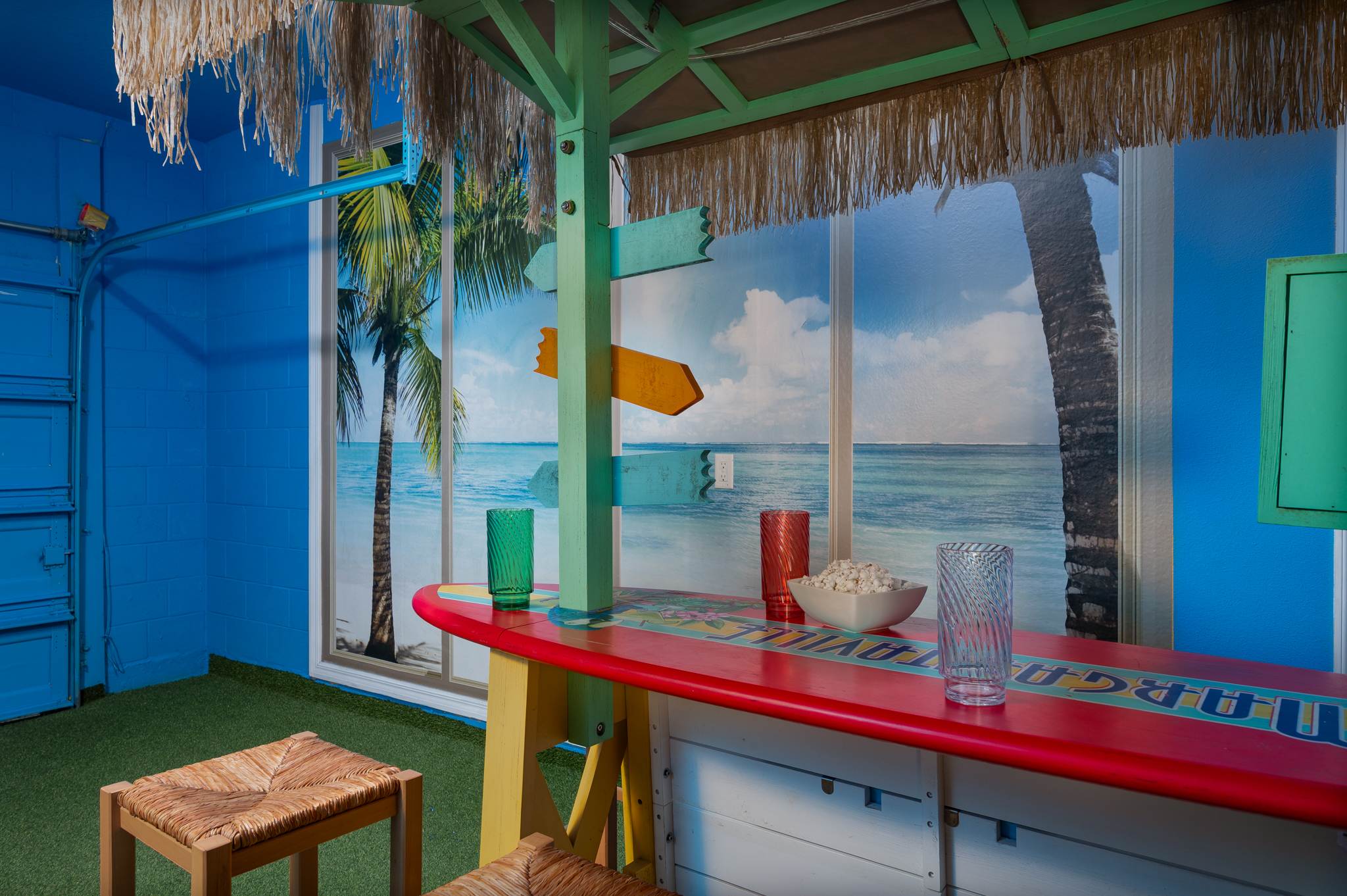 Love the tropical decor and vibrant colors? Our home is a guaranteed smile-inducer!
