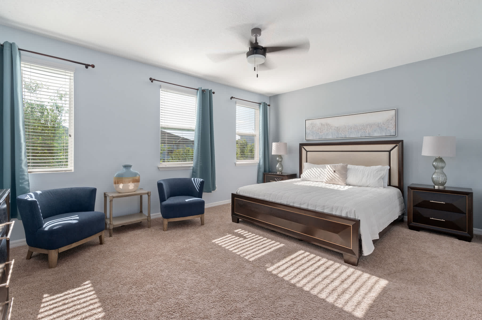 Drift off to sleep in our inviting bedroom, flooded with natural light, designed for your relaxation