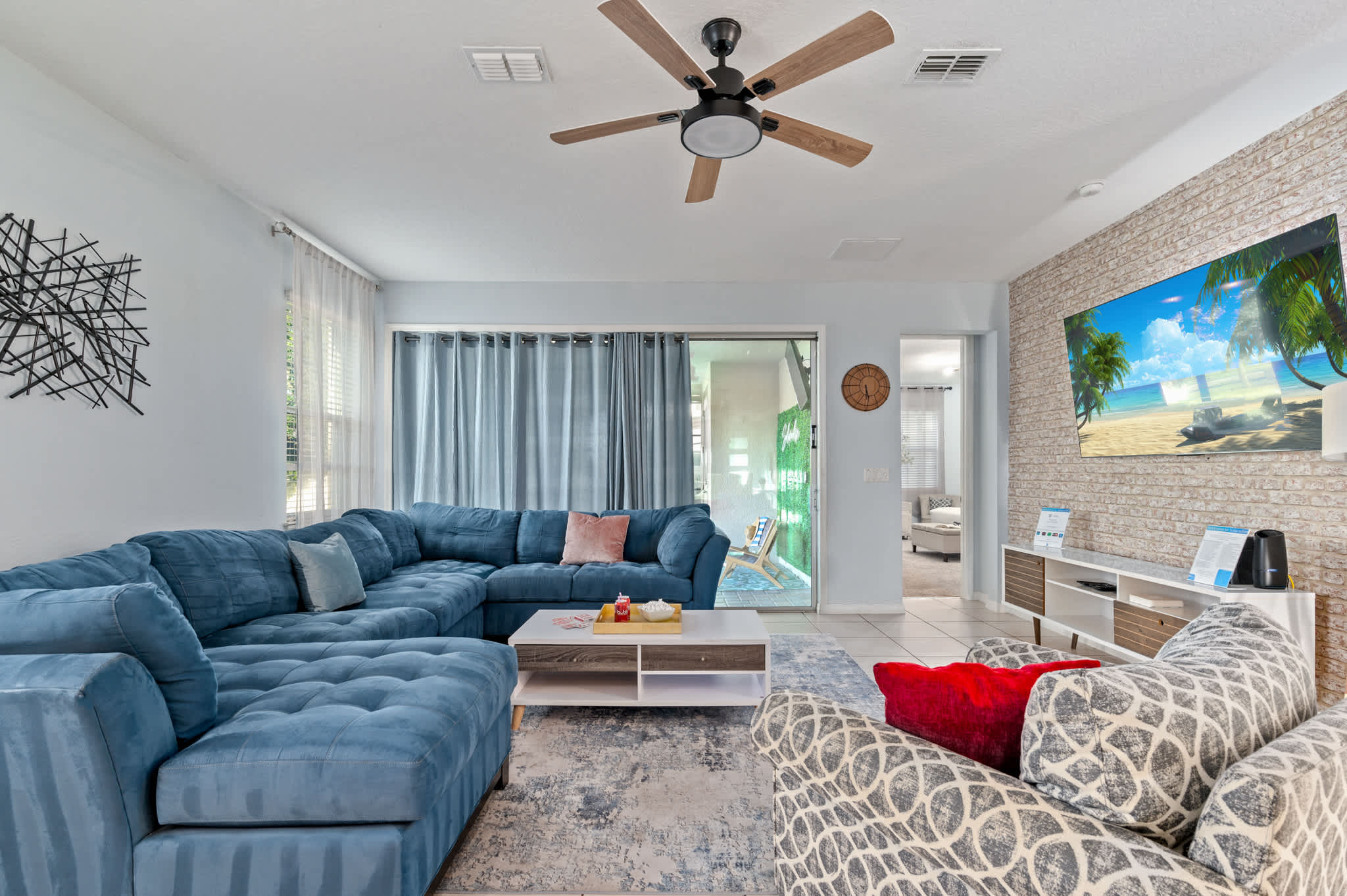 Kick back and relax in our spacious and stylish living area. Perfect for unwinding after a day of theme park adventures.