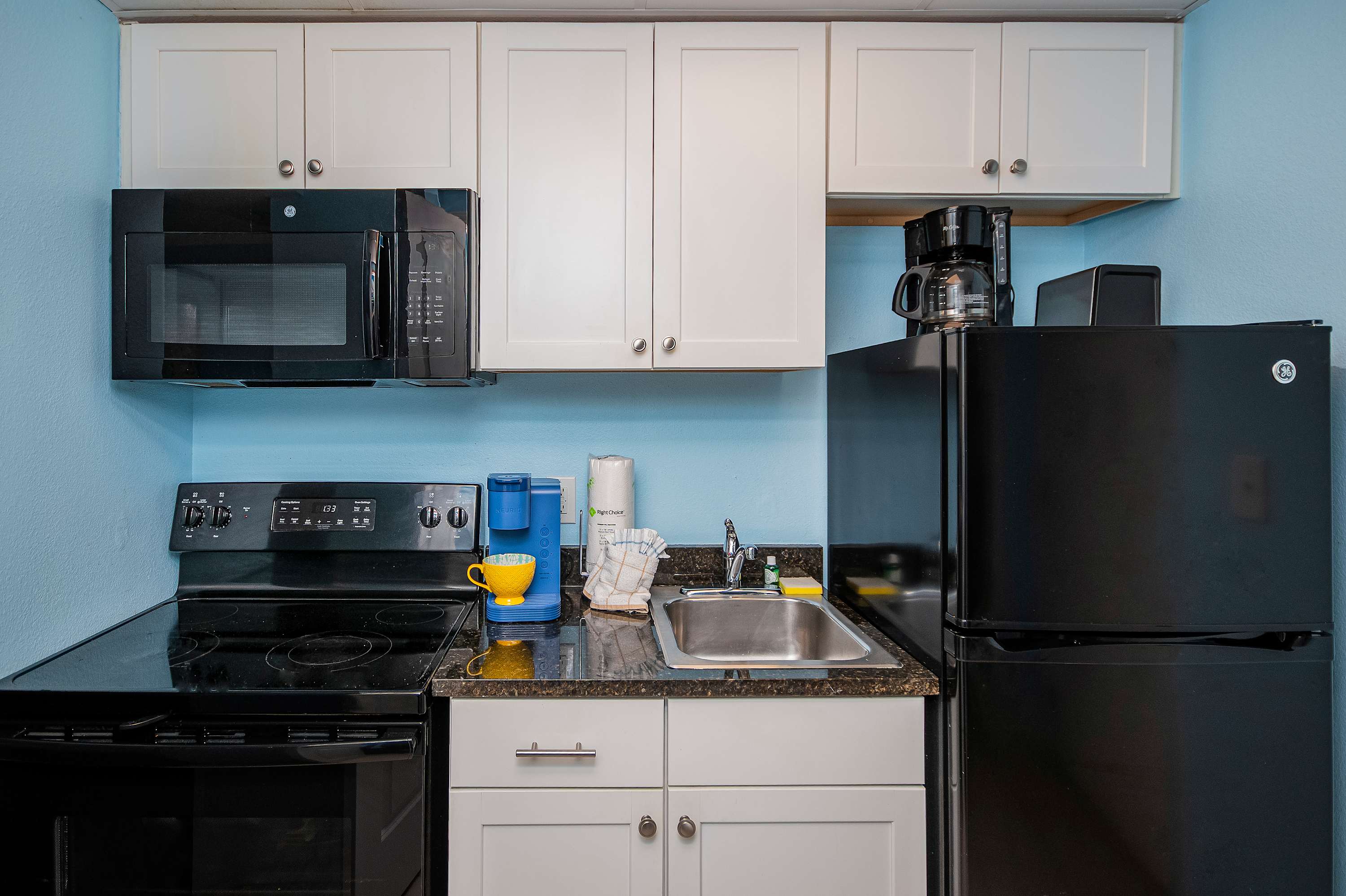 Enjoy the convenience of a kitchen stocked with cookware and utensils.