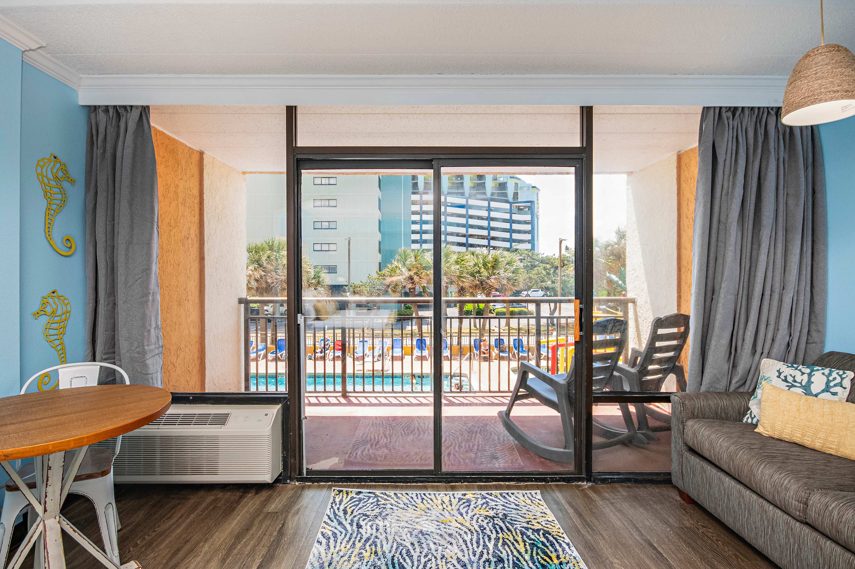 A balcony that brings the pool's energy right to you.