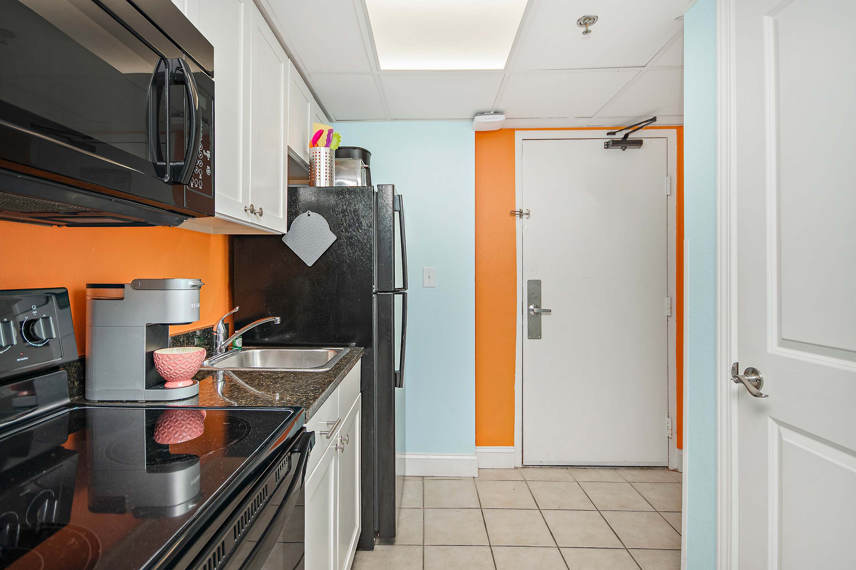 Modern appliances and thoughtful touches make this kitchen a standout.