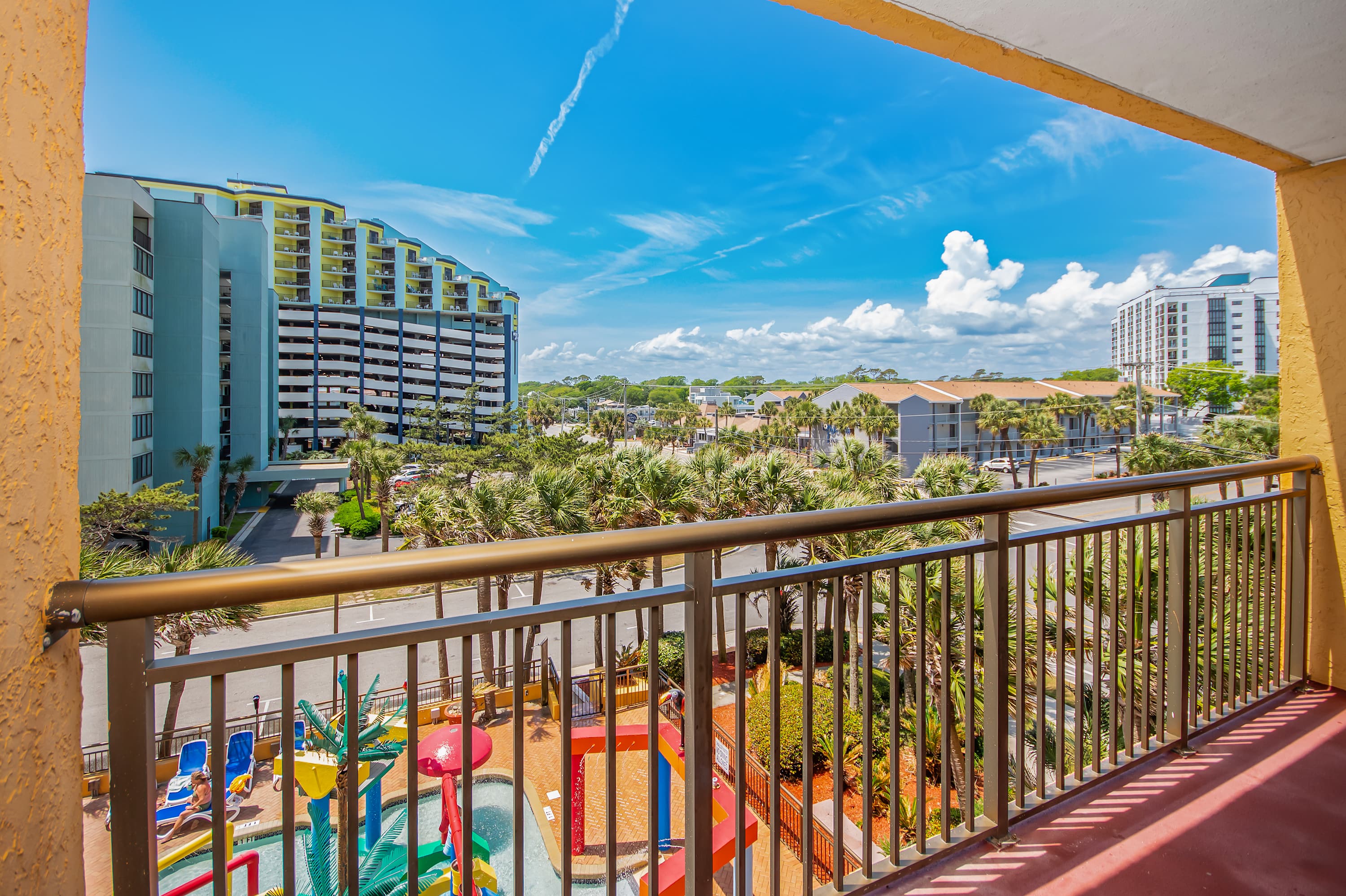 A perfect spot to unwind and watch the poolside fun below.
