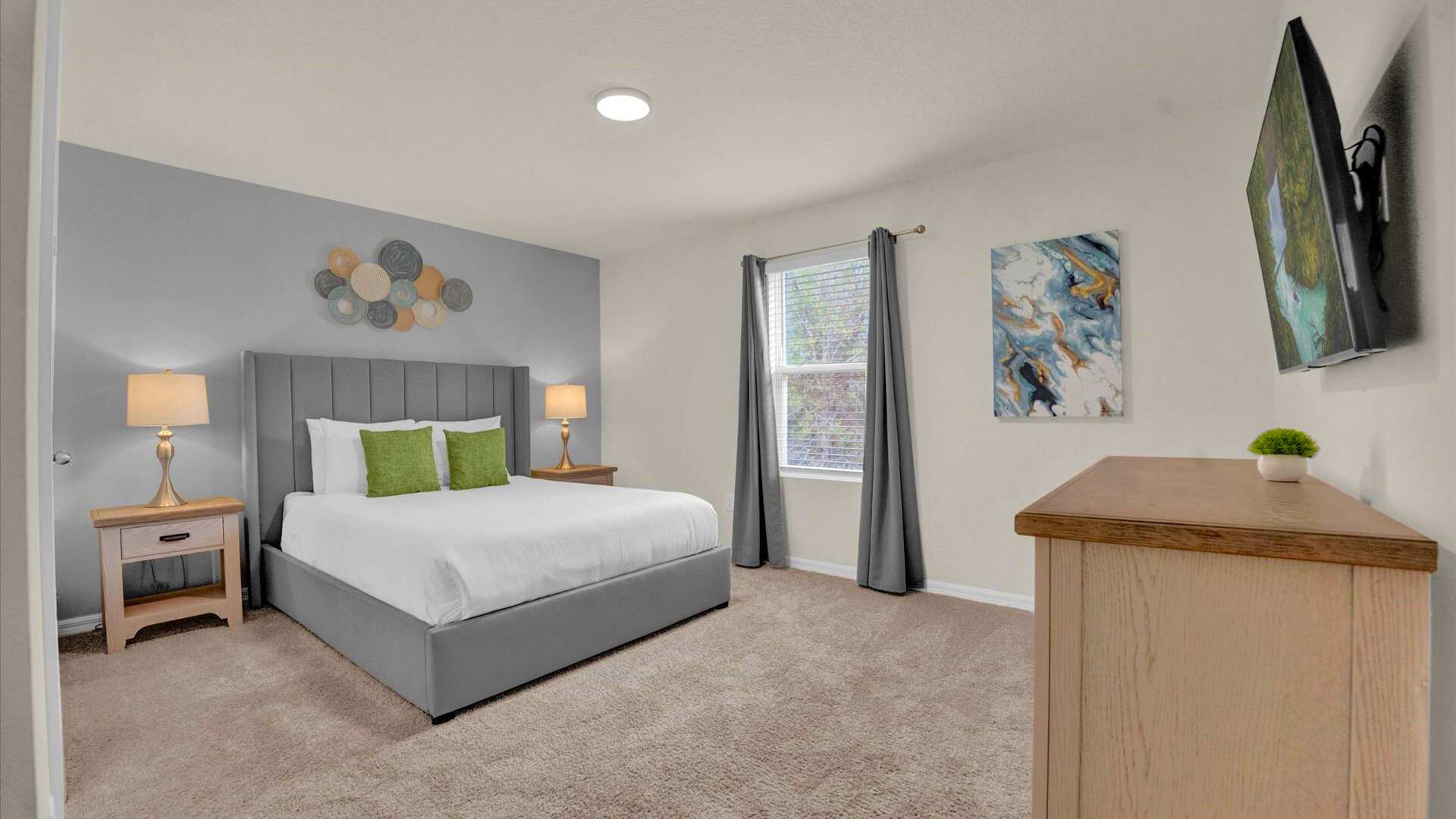 Queen bedroom with smart TV