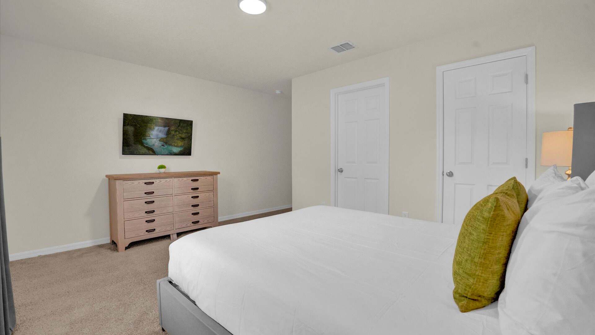 Spacious king bedroom suite with smart TV