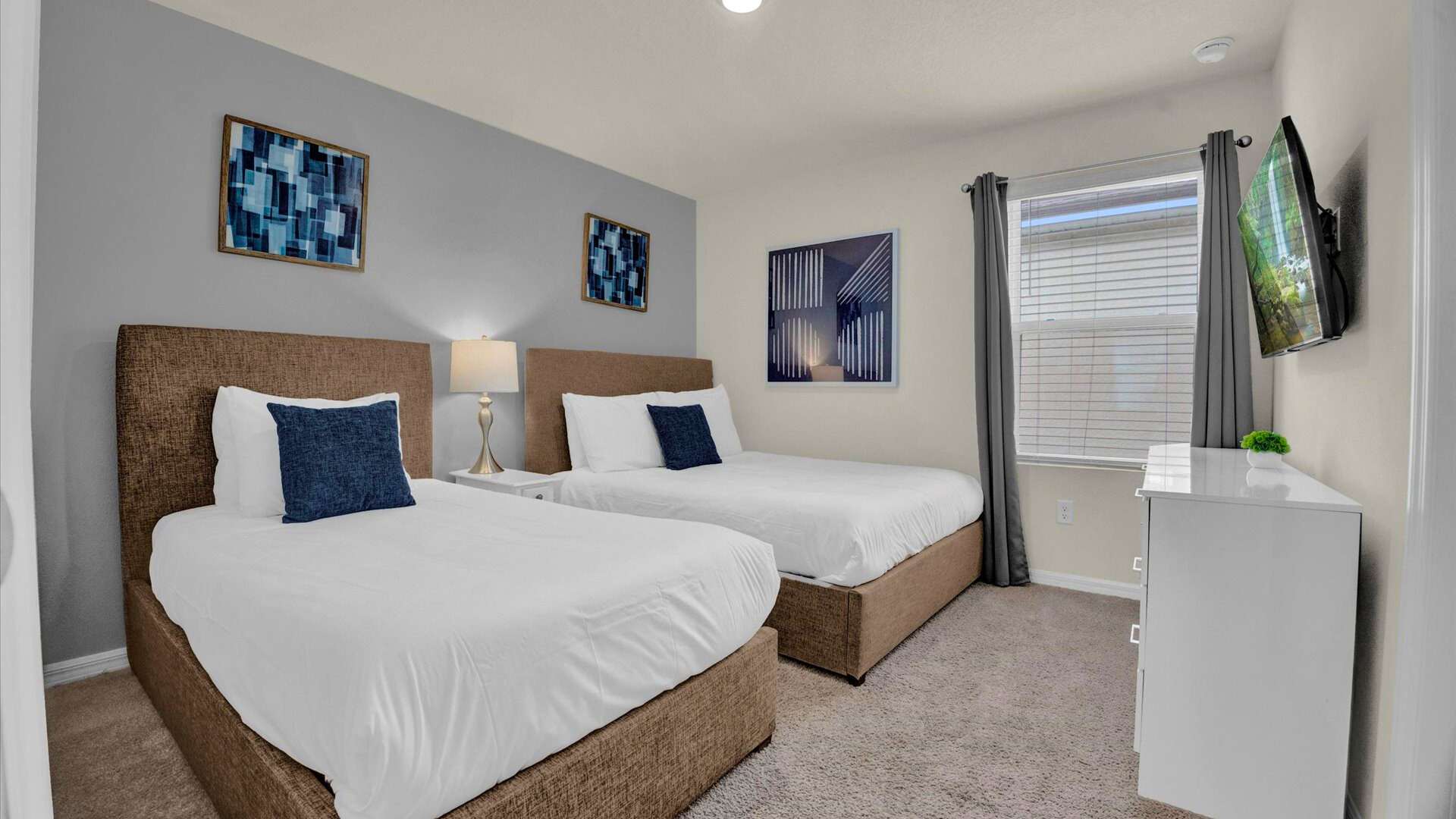 Stylish Bedroom with 2 Full beds and a smart TV