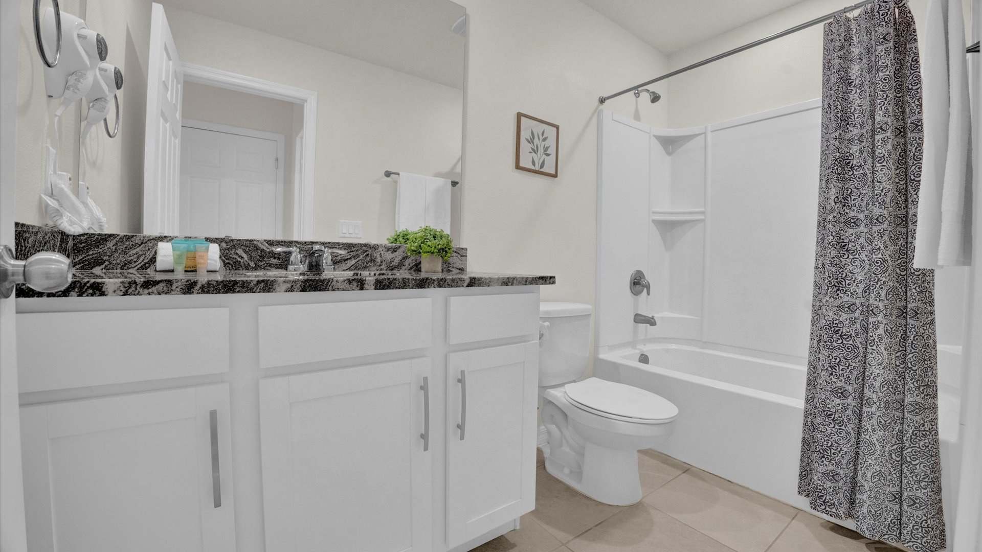 Full bathroom with integrated shower and bathtub