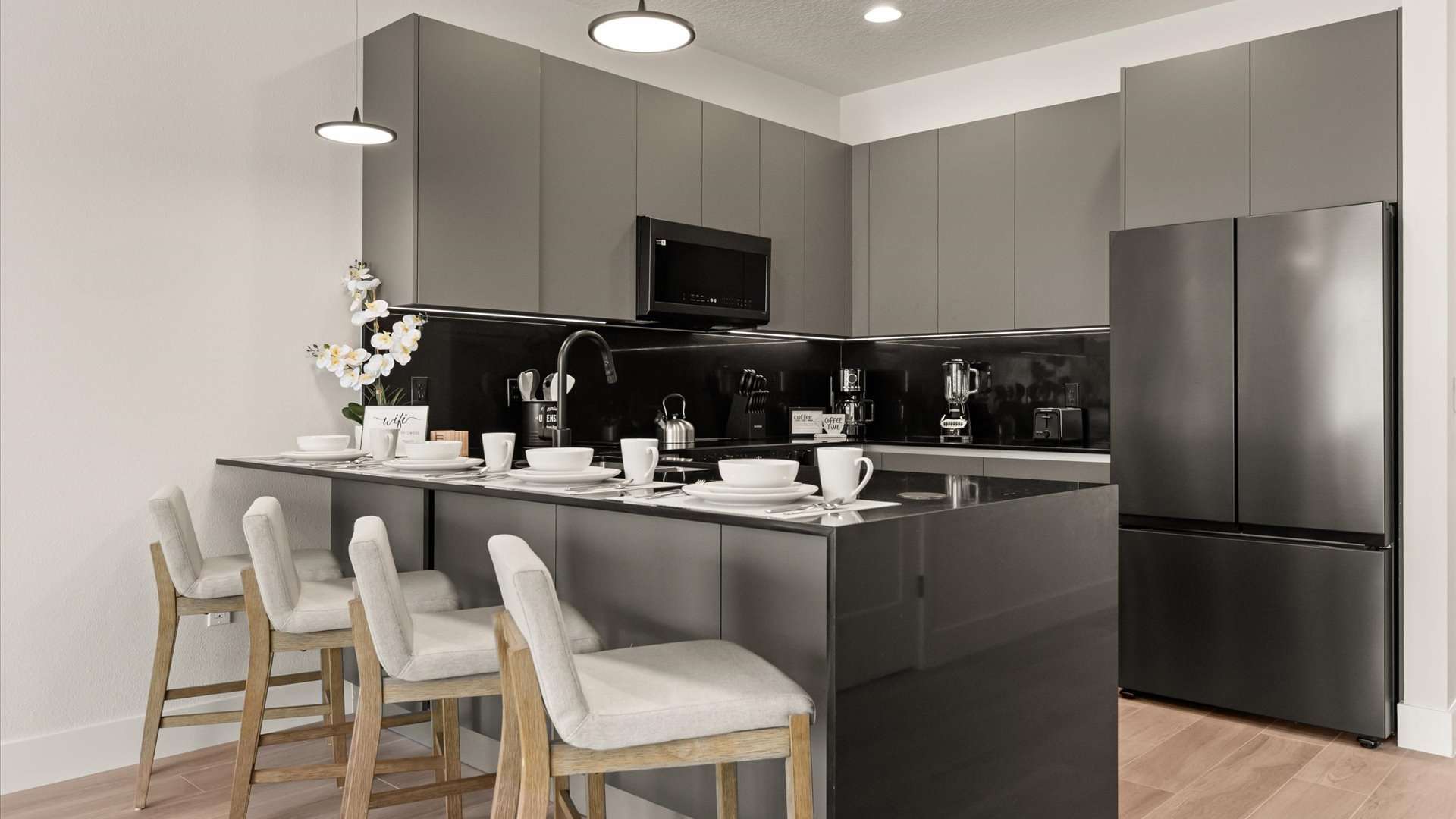 Kitchen area with spacious island and bar stools seating