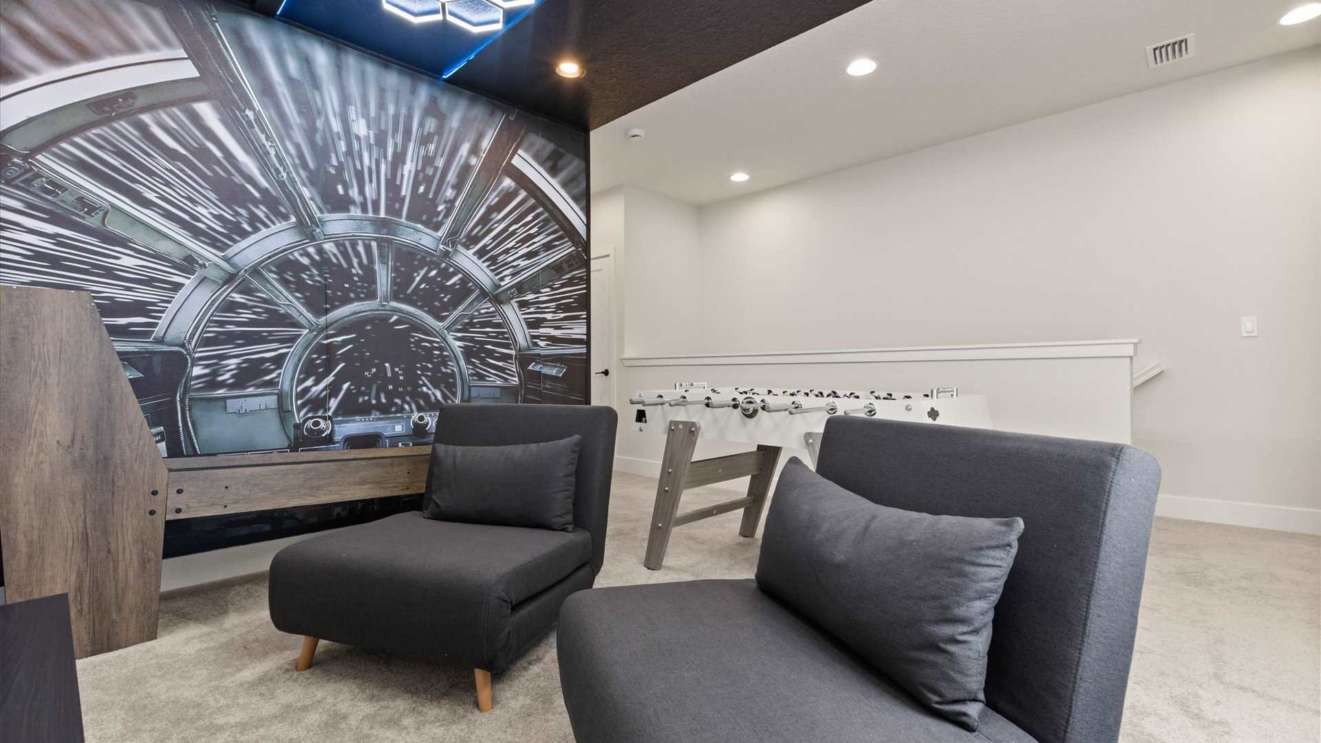 Games room with foosball and ski-ball and smart TV