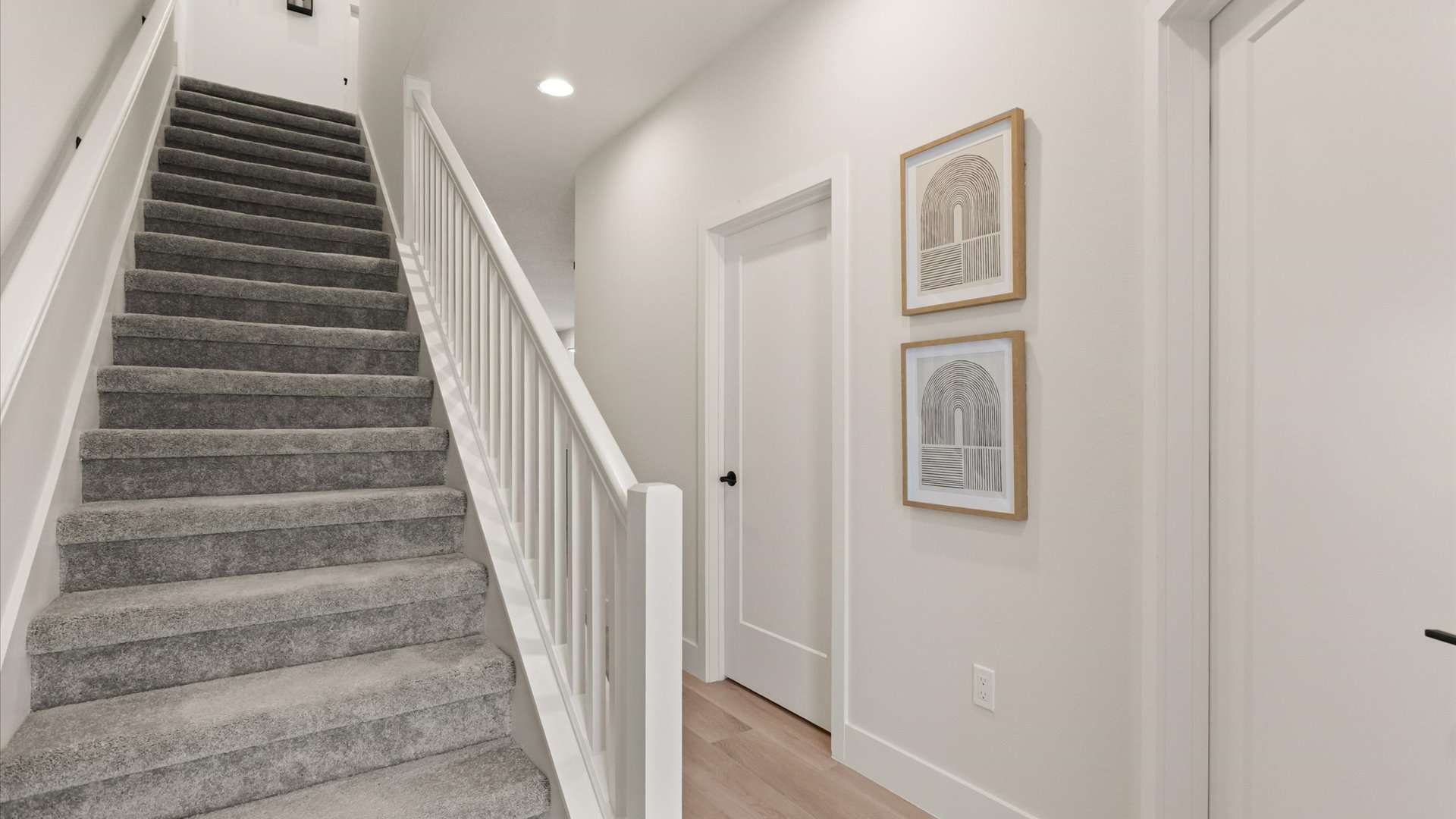 Staircase inside the home leading upstairs