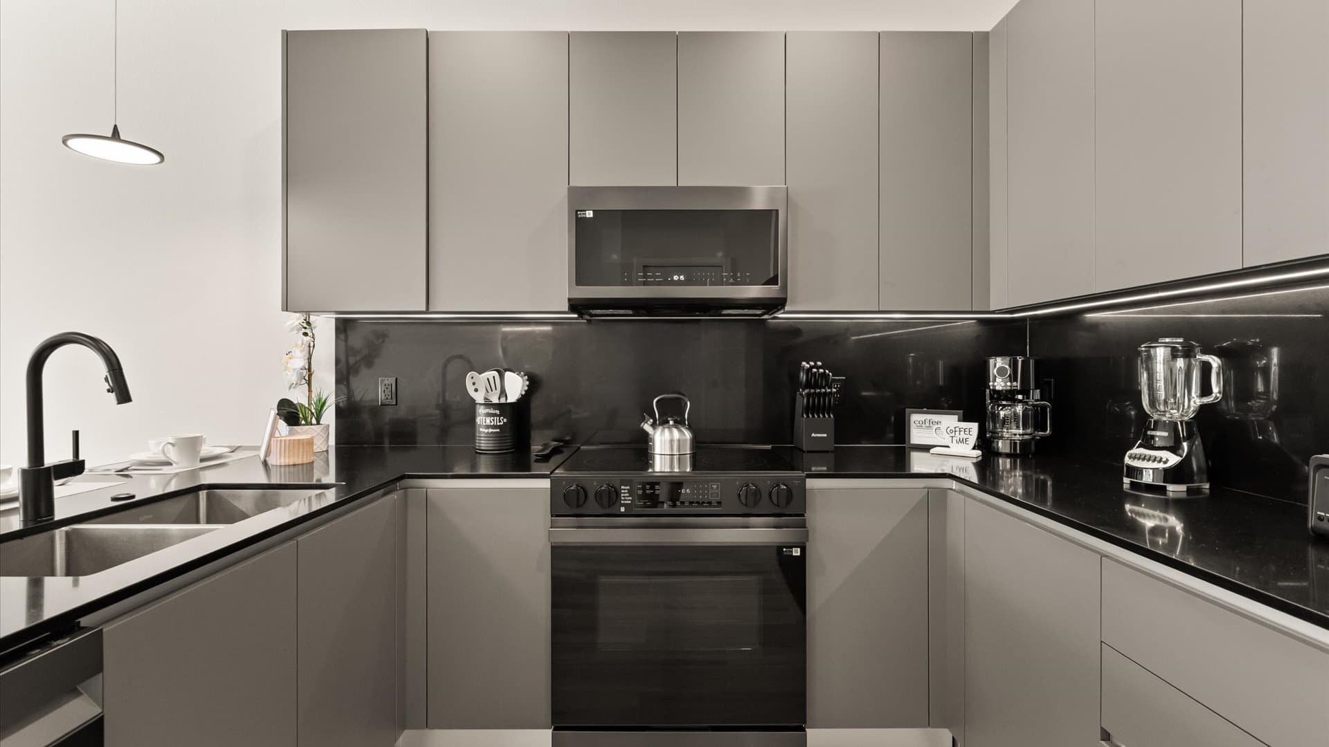 Modern fully equipped kitchen with pristine appliances