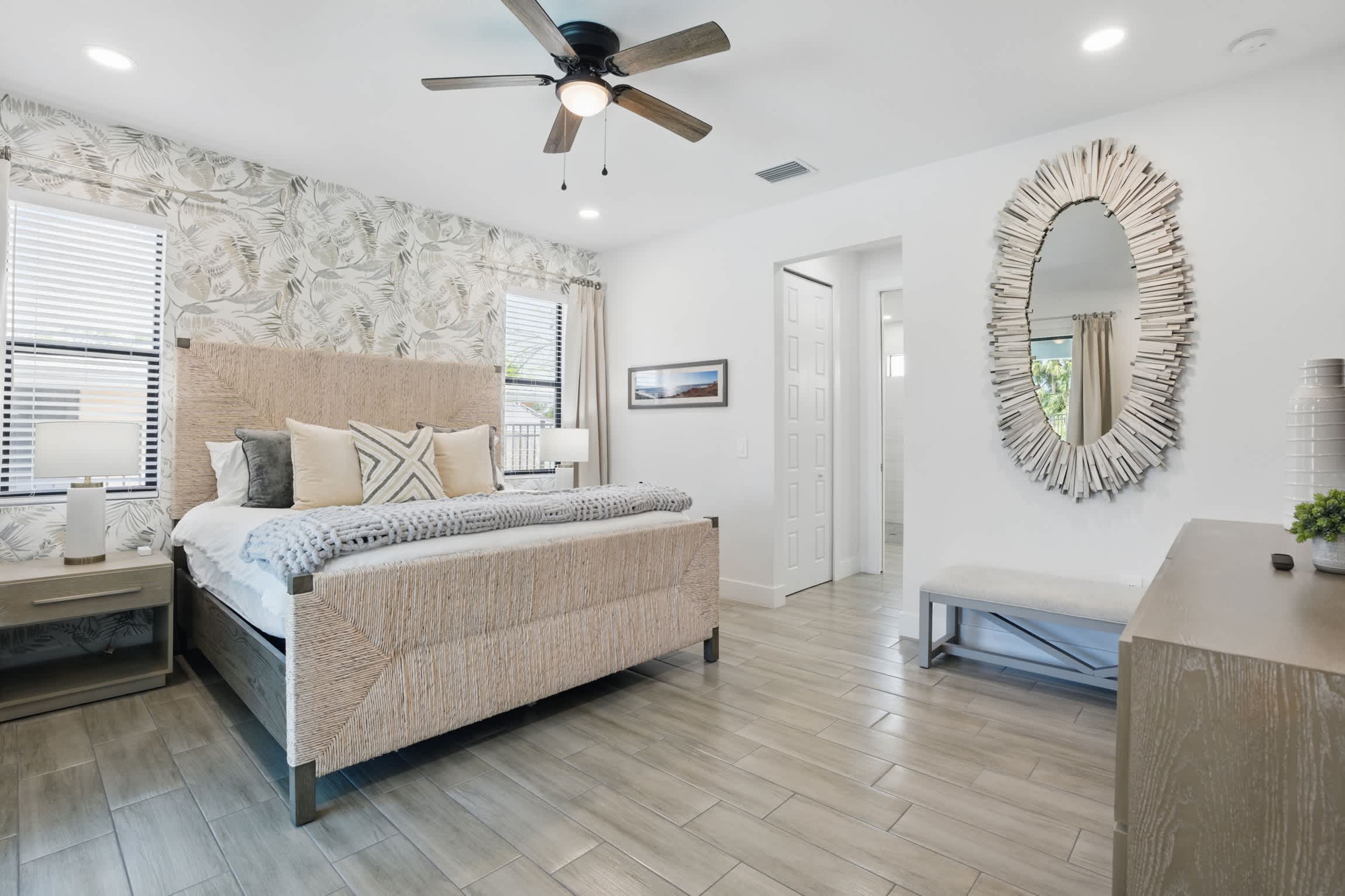 The main bedroom suite is large and is the entire right side of the home