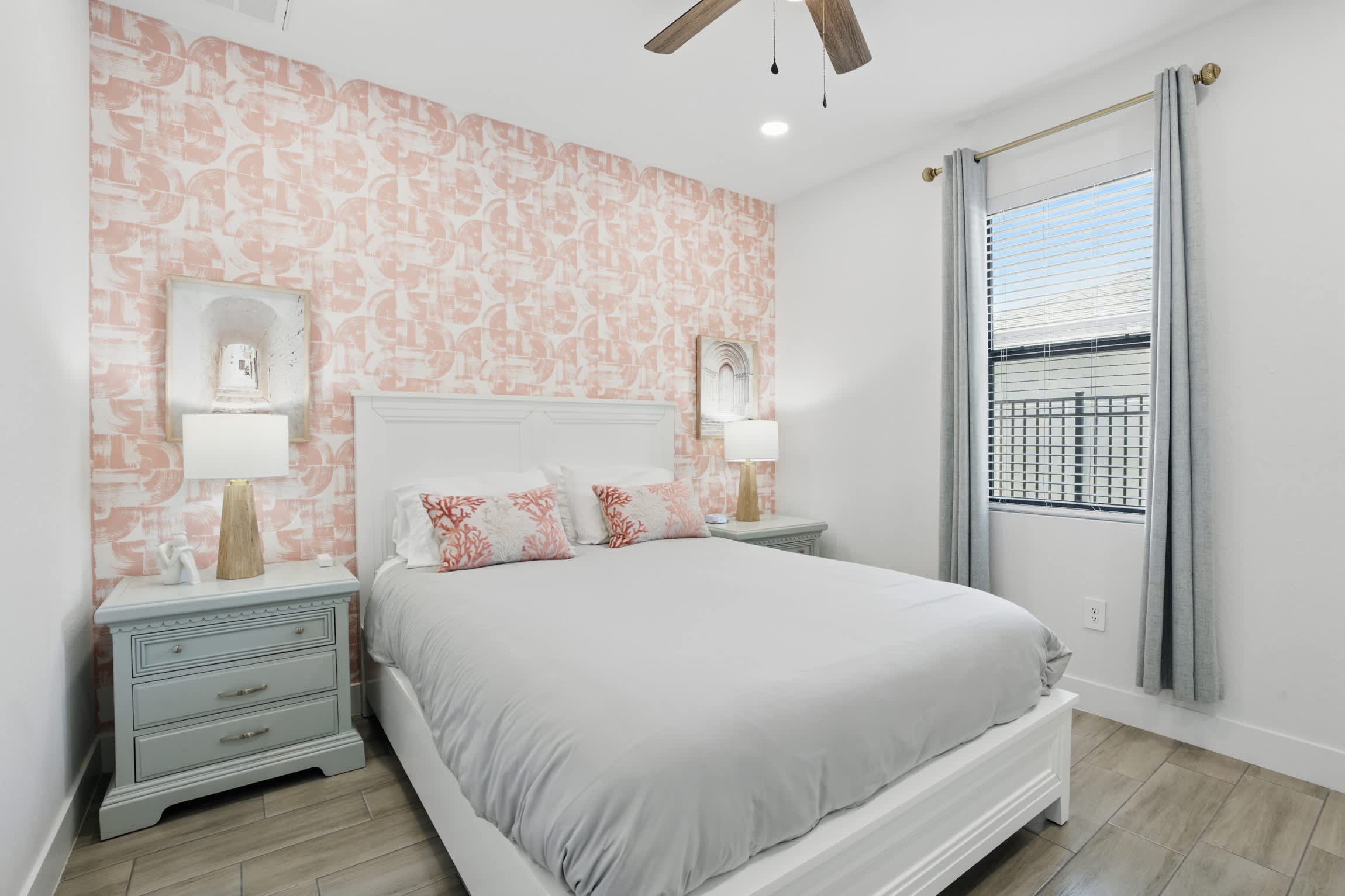 Bedroom #2 has a Queen bed and a ceiling fan 