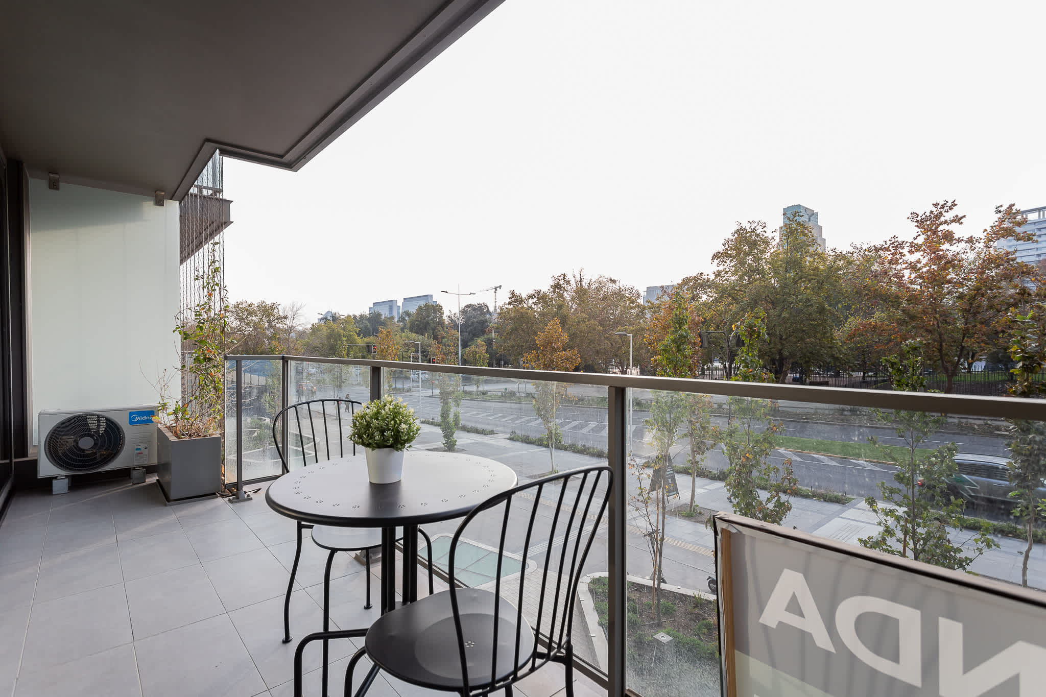 Relax on the private balcony with stunning city views, perfect for enjoying a morning coffee or evening drink.