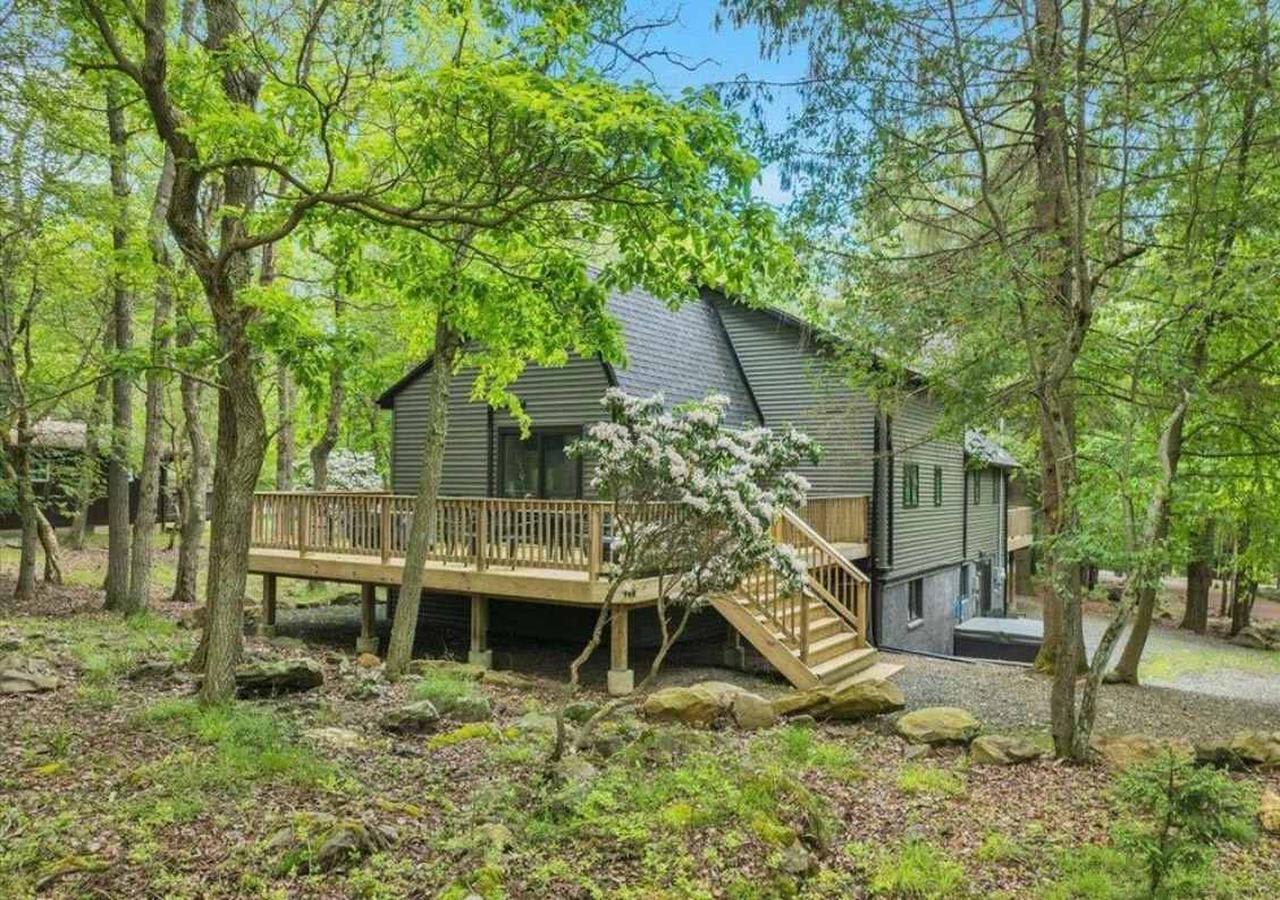 Tucked in Nature Set back from the road and nestled in the woods, the
home offers privacy and a peaceful forest setting.
