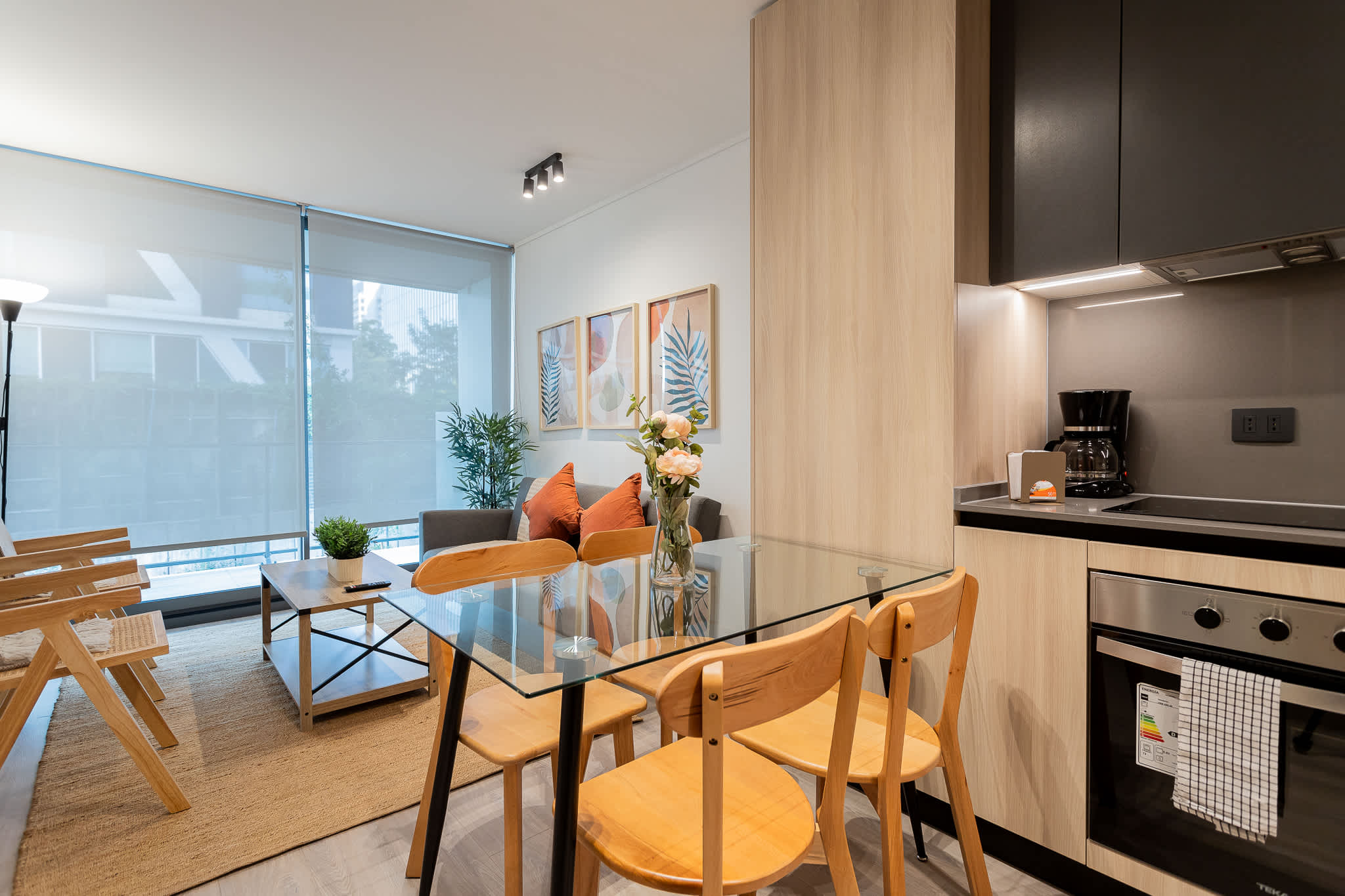 Bright and modern living space with cozy seating and dining area for memorable meals.