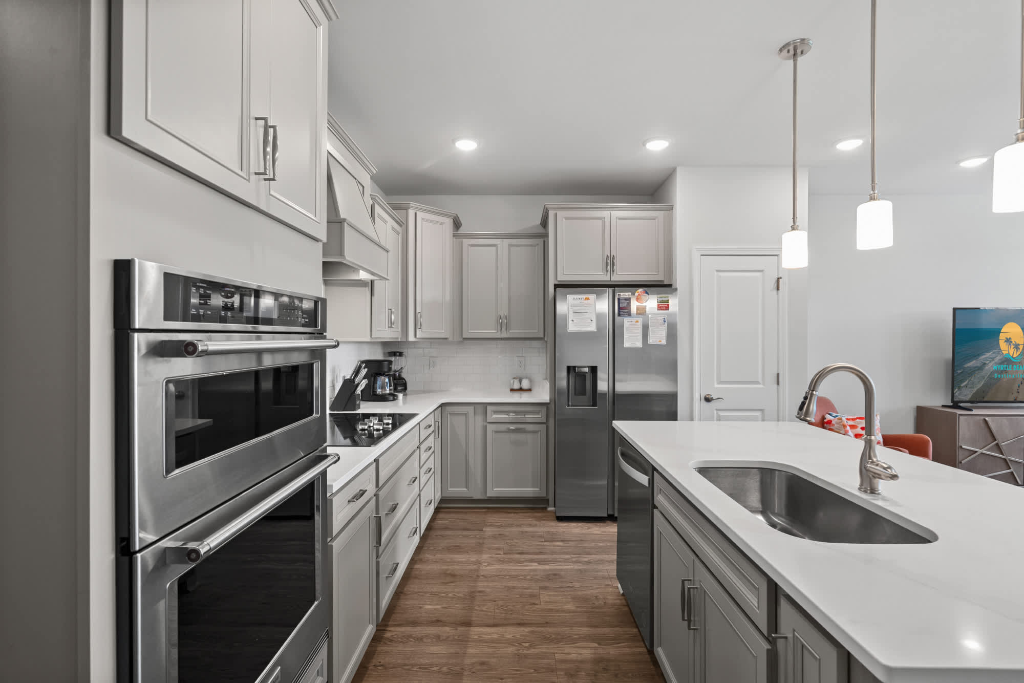 Kitchen featuring all essential appliances.