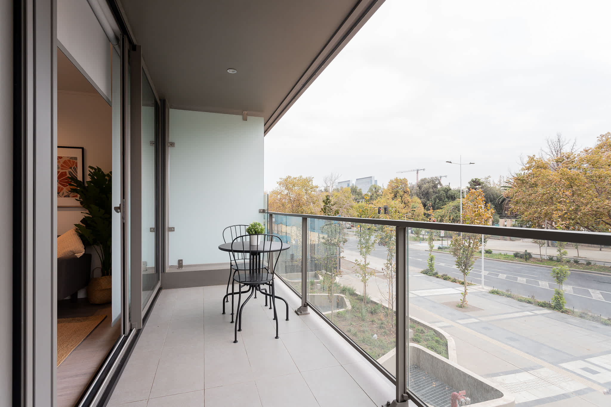 Relax on your private balcony with stunning urban views, perfect for enjoying a morning coffee or evening drink.