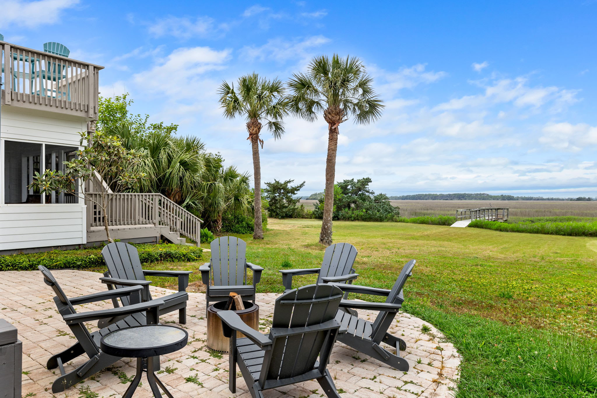 Back patio seating with Folly Creek views! 