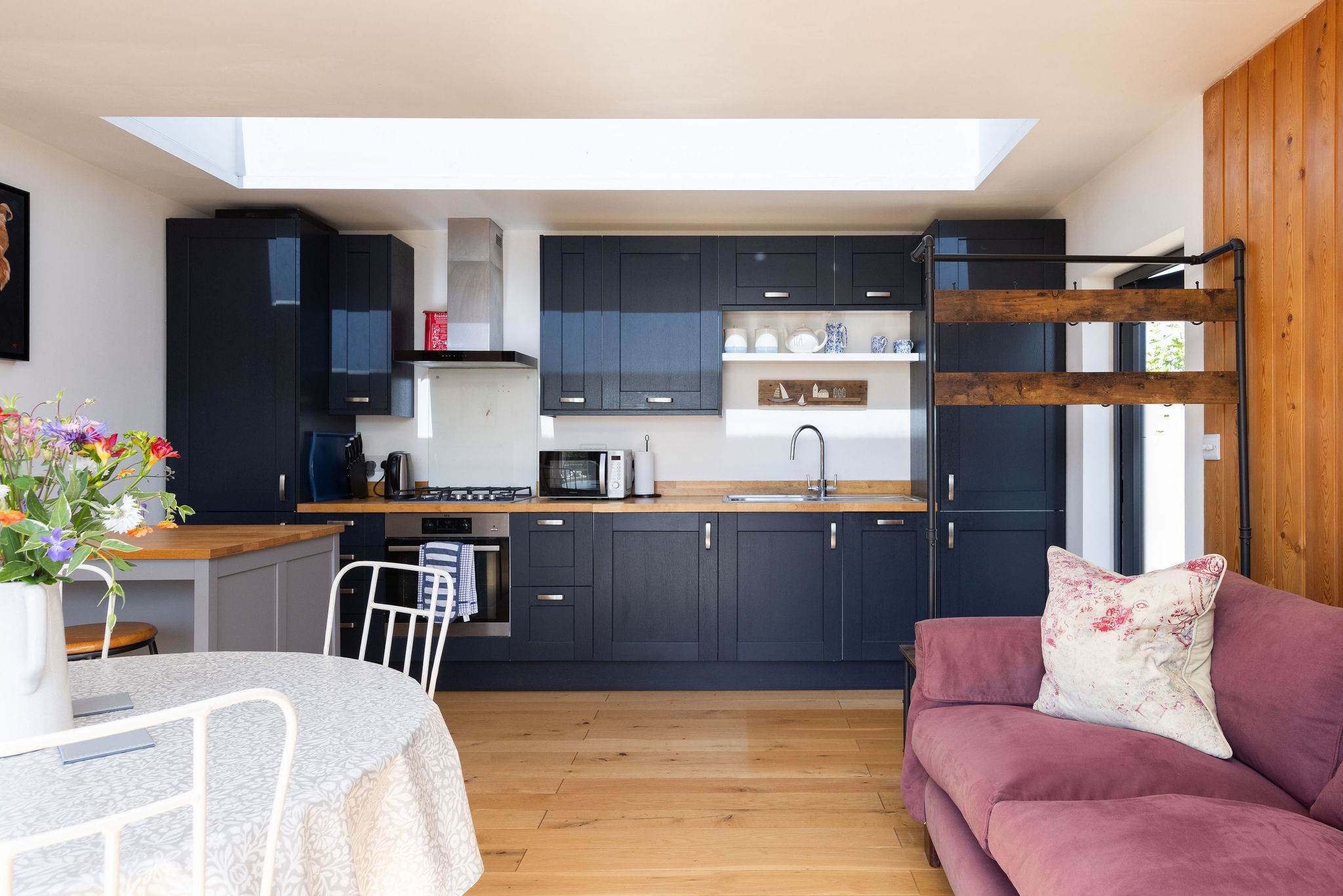 Relax and unwind in this inviting kitchen and living room.