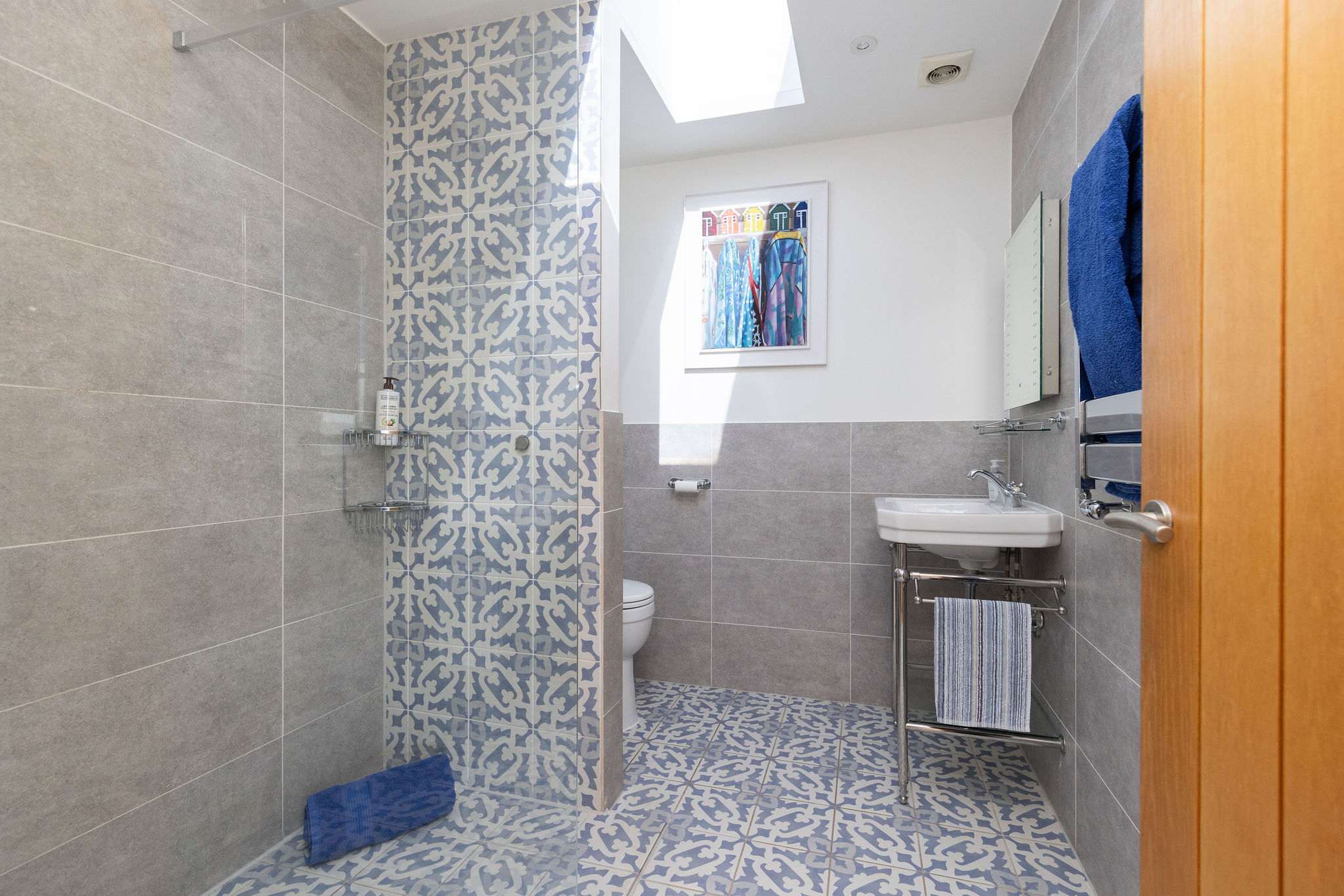 Enjoy a refreshing experience in this contemporary bathroom.