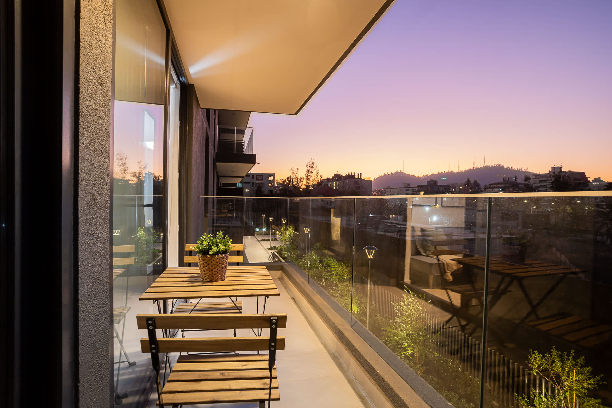 Enjoy breathtaking sunset views from this stylish terrace, perfect for relaxing evenings in the city.