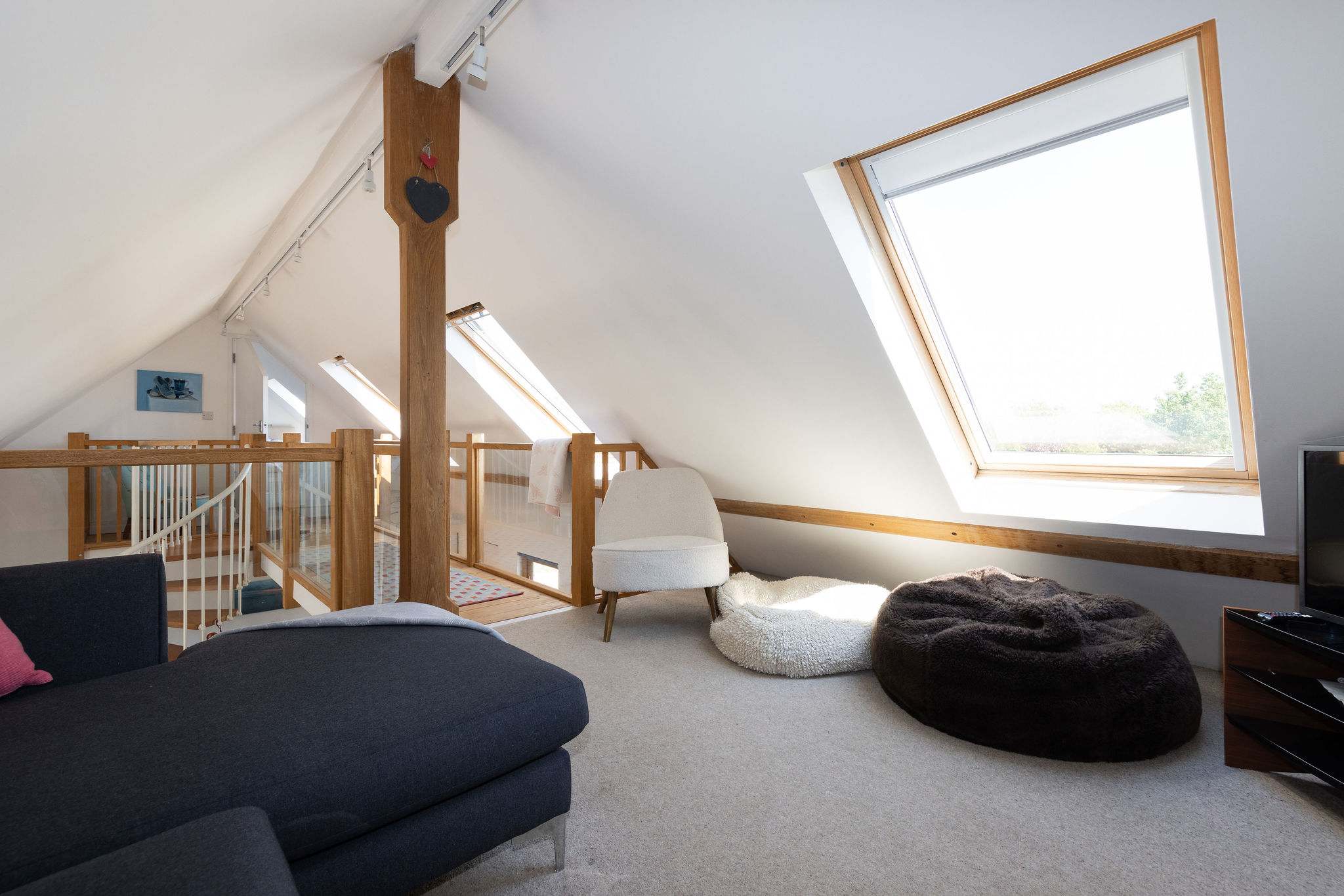 Discover the ultimate relaxation spot on our comfortable upper level.