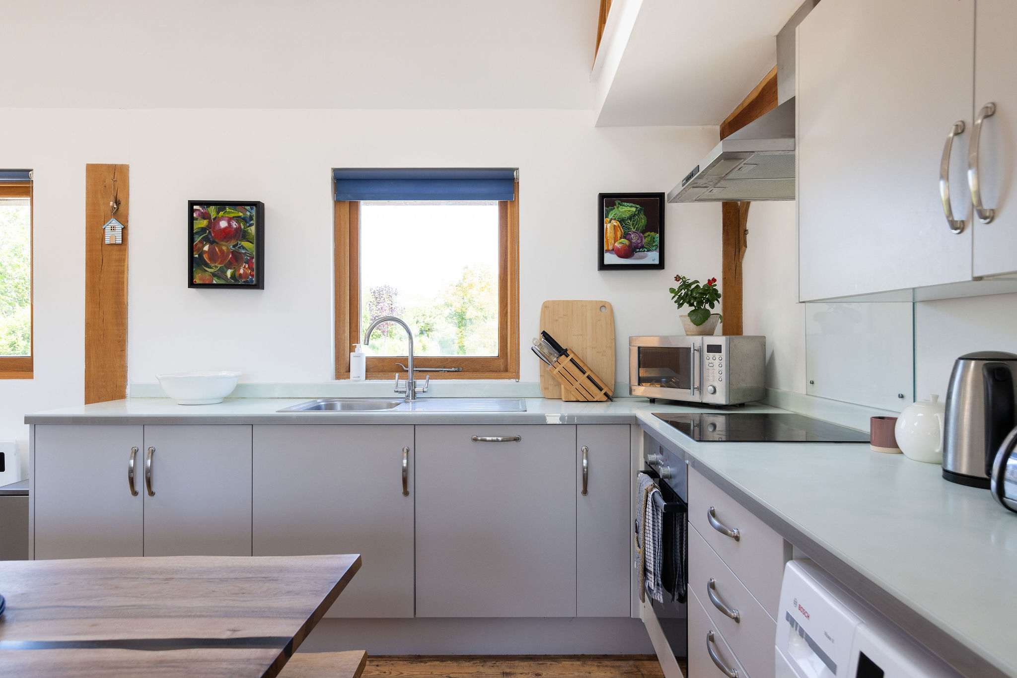 Our fully equipped kitchen boasts a coffee maker, microwave, oven, and more.