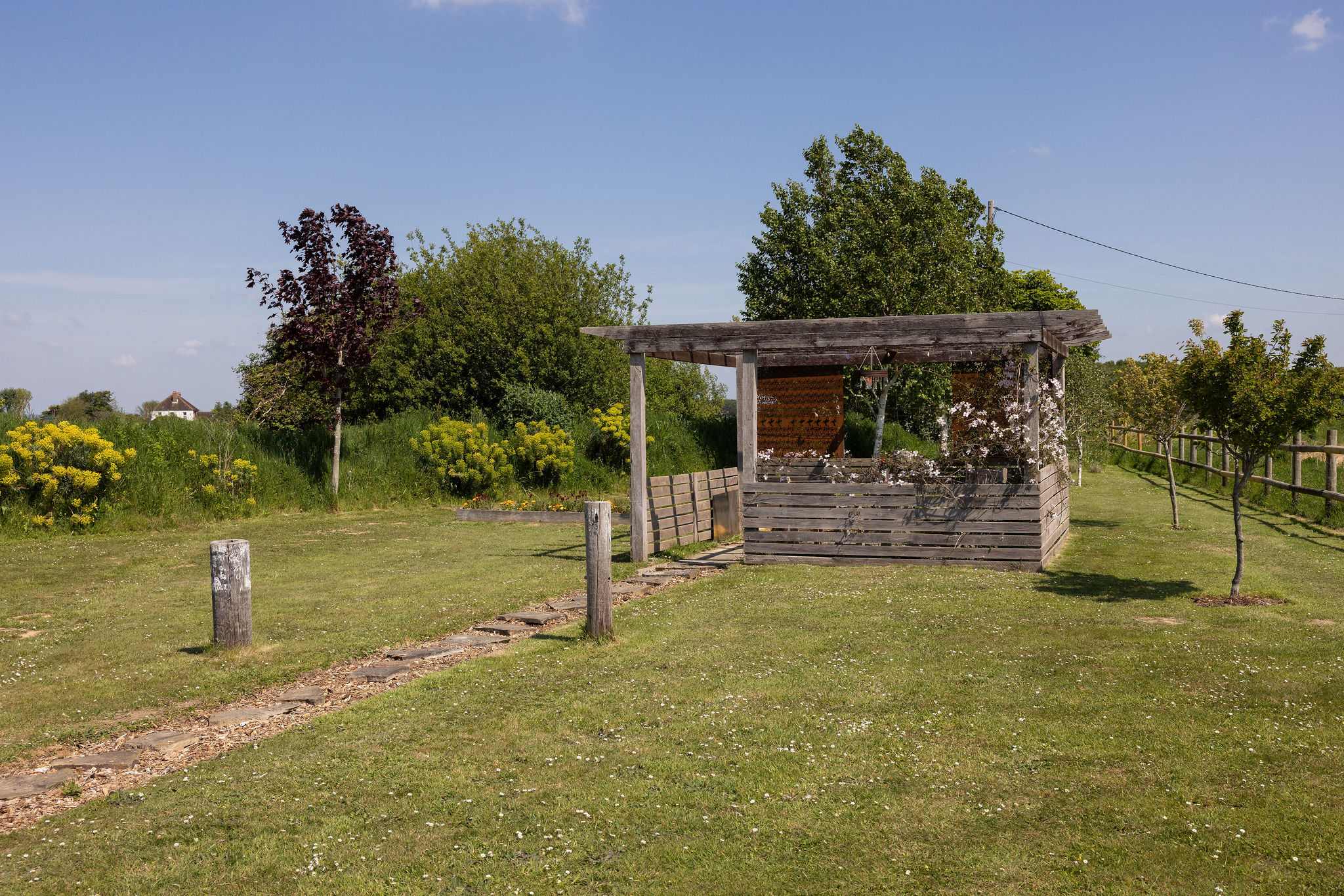 This property boasts a truly serene outdoor space, perfect for relaxation and reconnecting with nature.