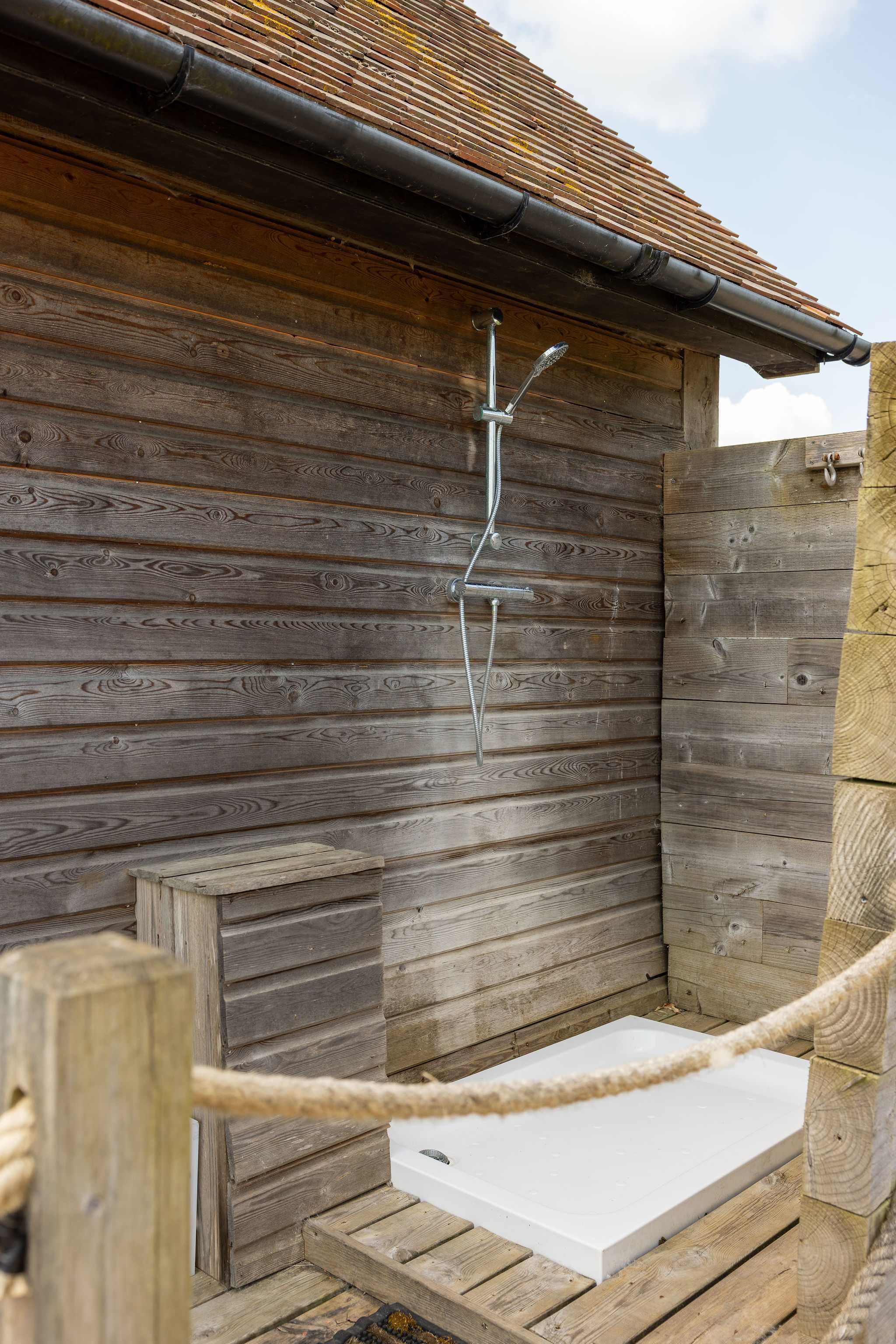 The unique outdoor shower is perfect for rinsing off after a surf or day at the beach.