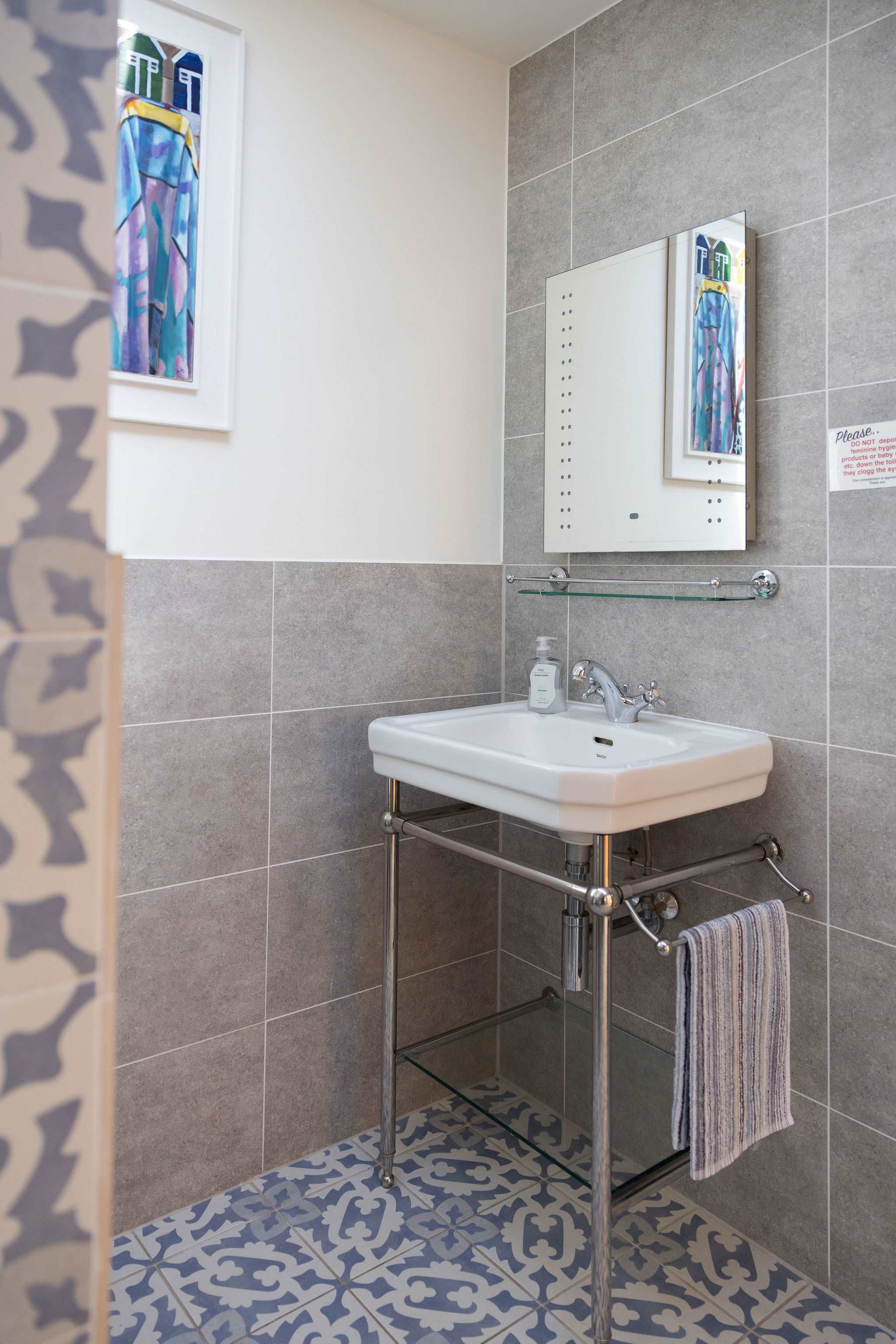 Stylish bathroom with modern fixtures.
