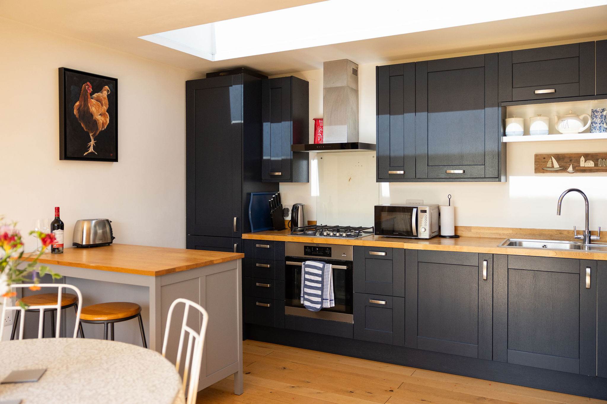 The fully-equipped kitchen has everything you need to prepare meals and beach picnics.