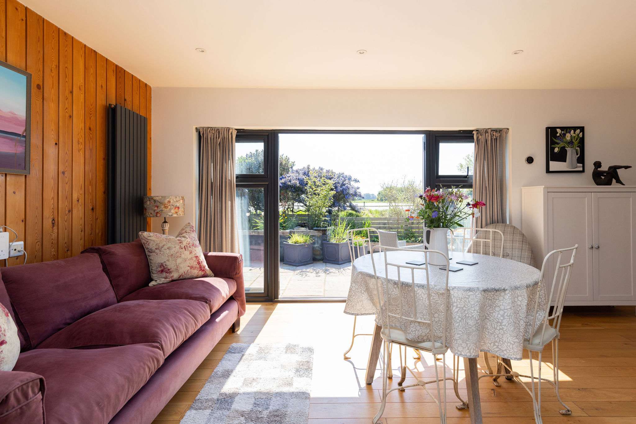 Open up the patio doors on warmer days and let the breeze in.