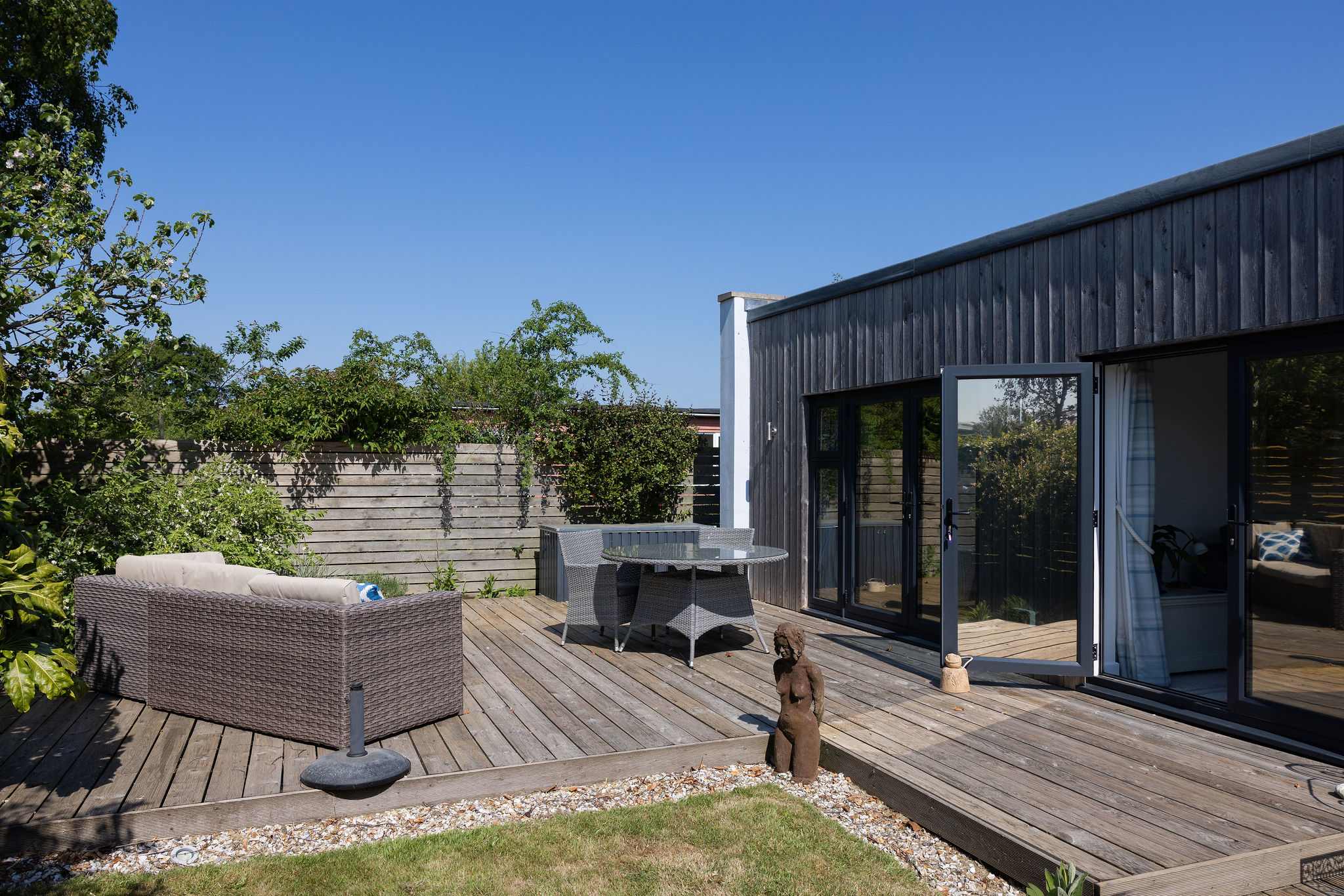 Unwind in style on this beautiful outdoor patio, perfect for morning coffee or evening gatherings.