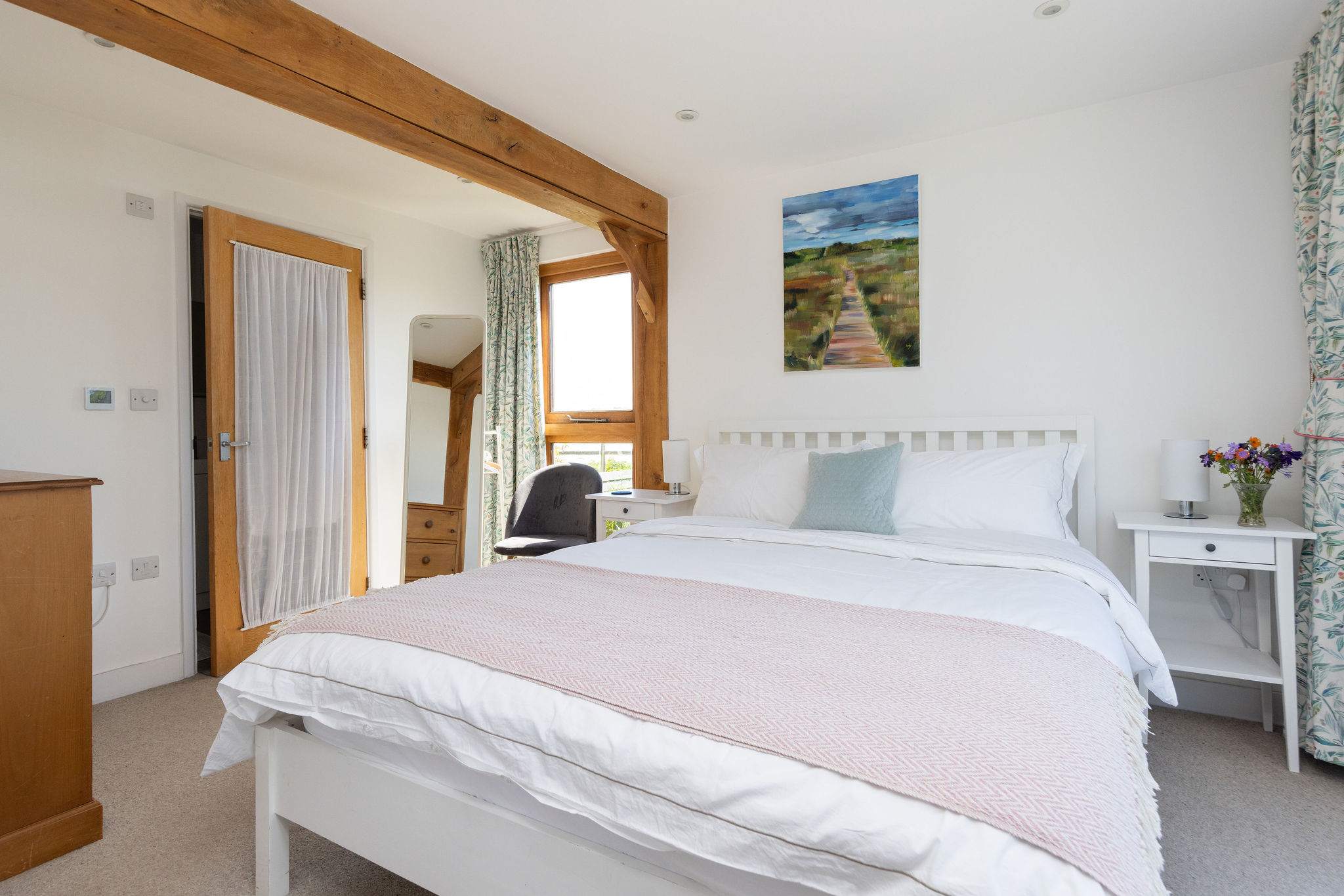 This cosy king bed awaits to offer you a peaceful and comfortable night's sleep.