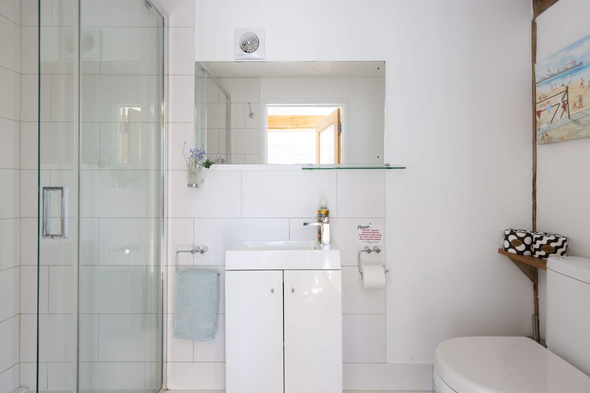 Freshen up after a day at the beach or exploring the local area, stocked with fresh towels and essential toiletries.