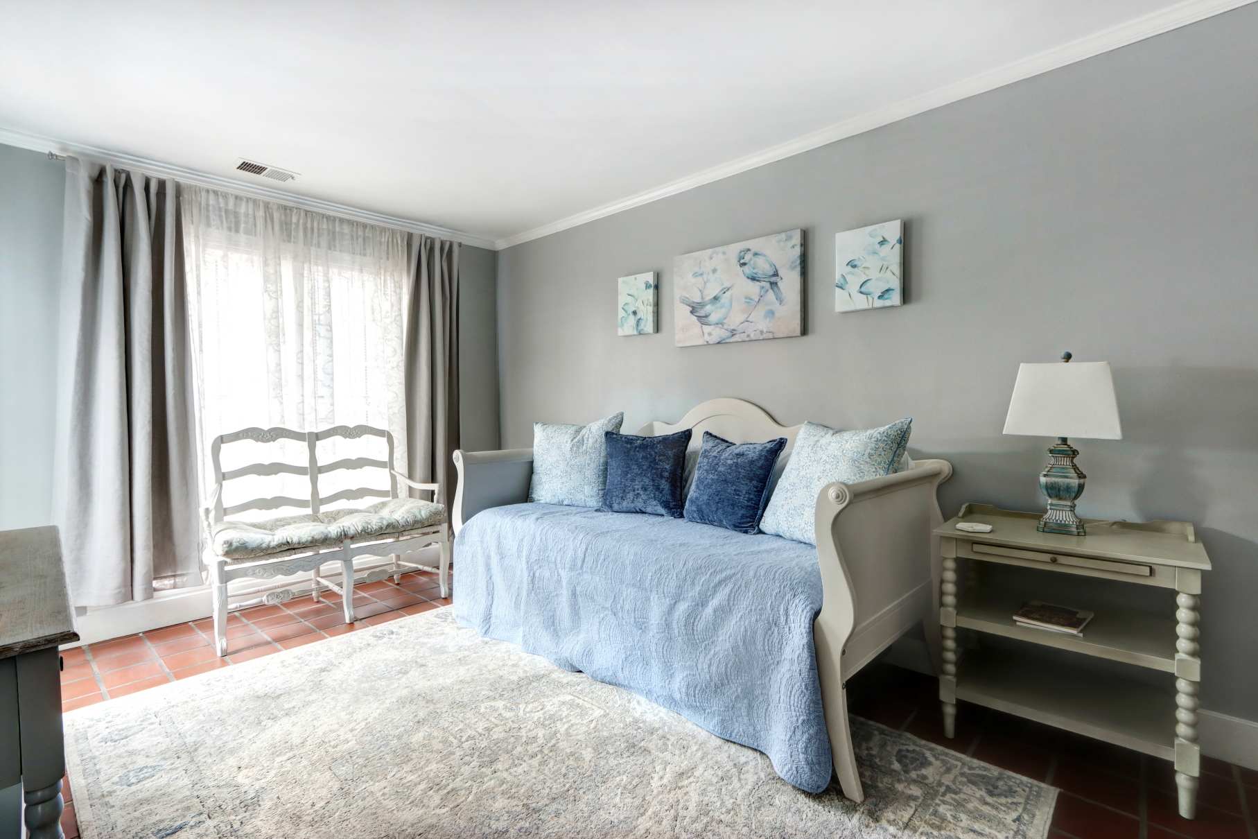 Daybed with a trundle underneath that can be pulled out and used as needed!