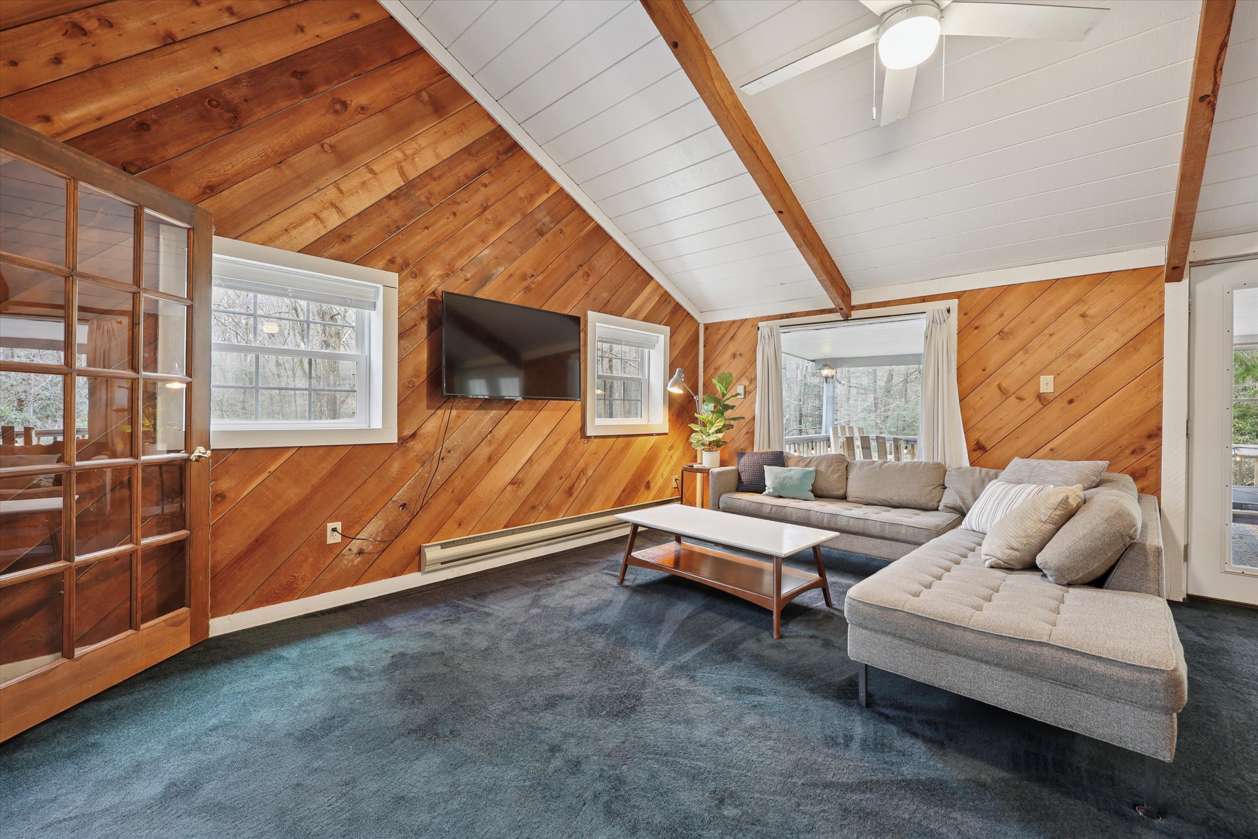 Stretch out on the plush sectional and catch up on your favorite shows in this cozy den.